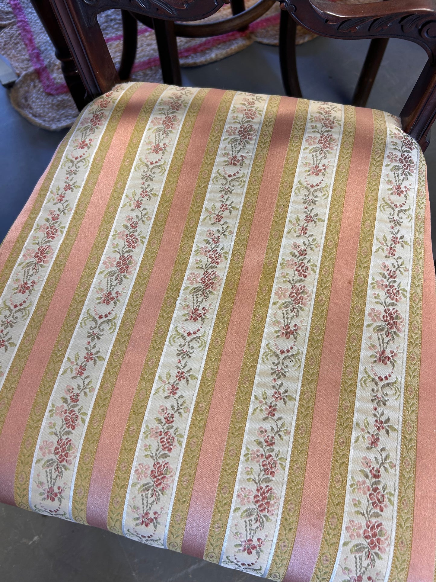 A pair of pretty pink fabric carved wood Edwardian chairs