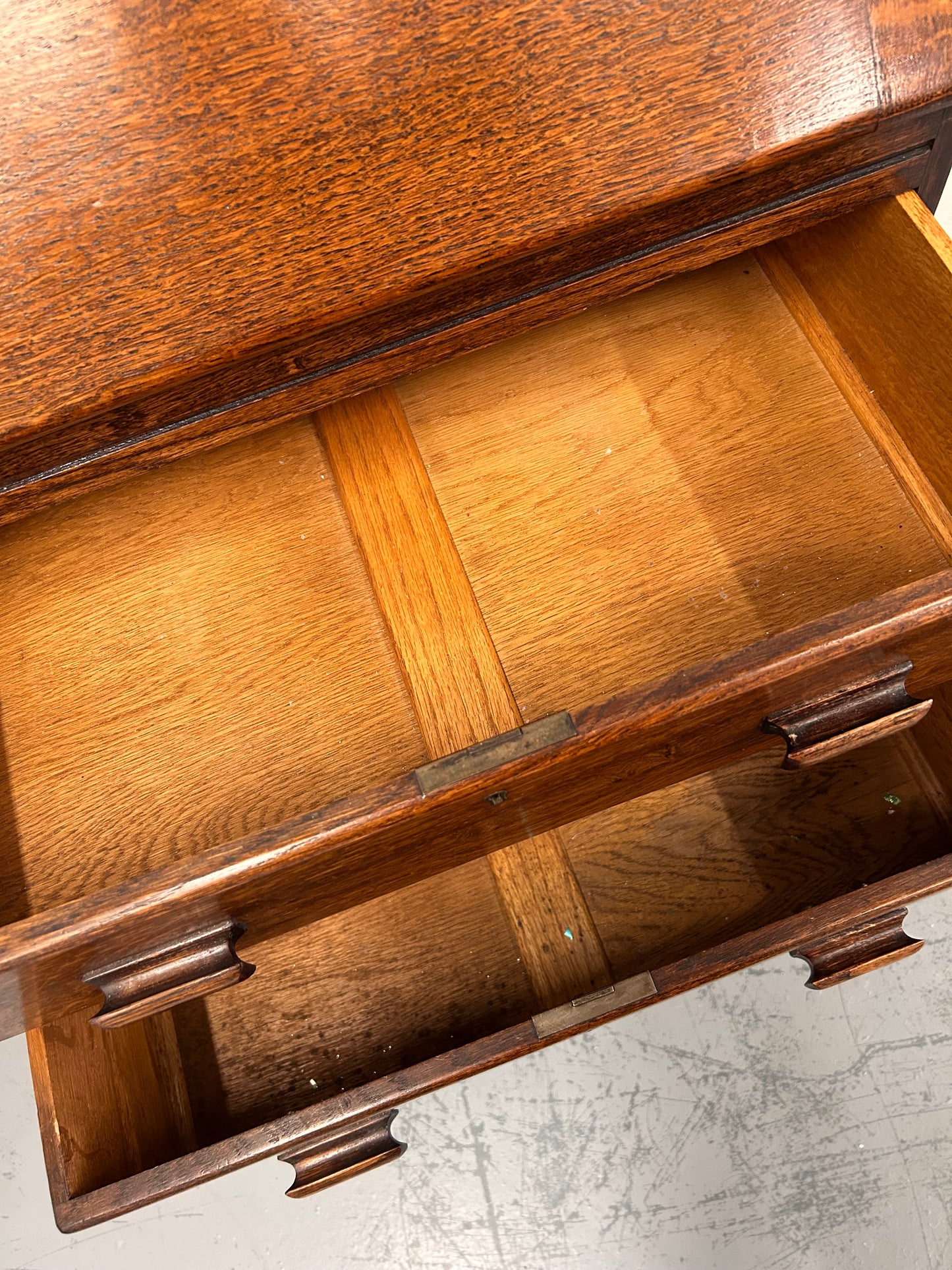 A lovely little vintage compact oak bureau with drop down writing surface and storage