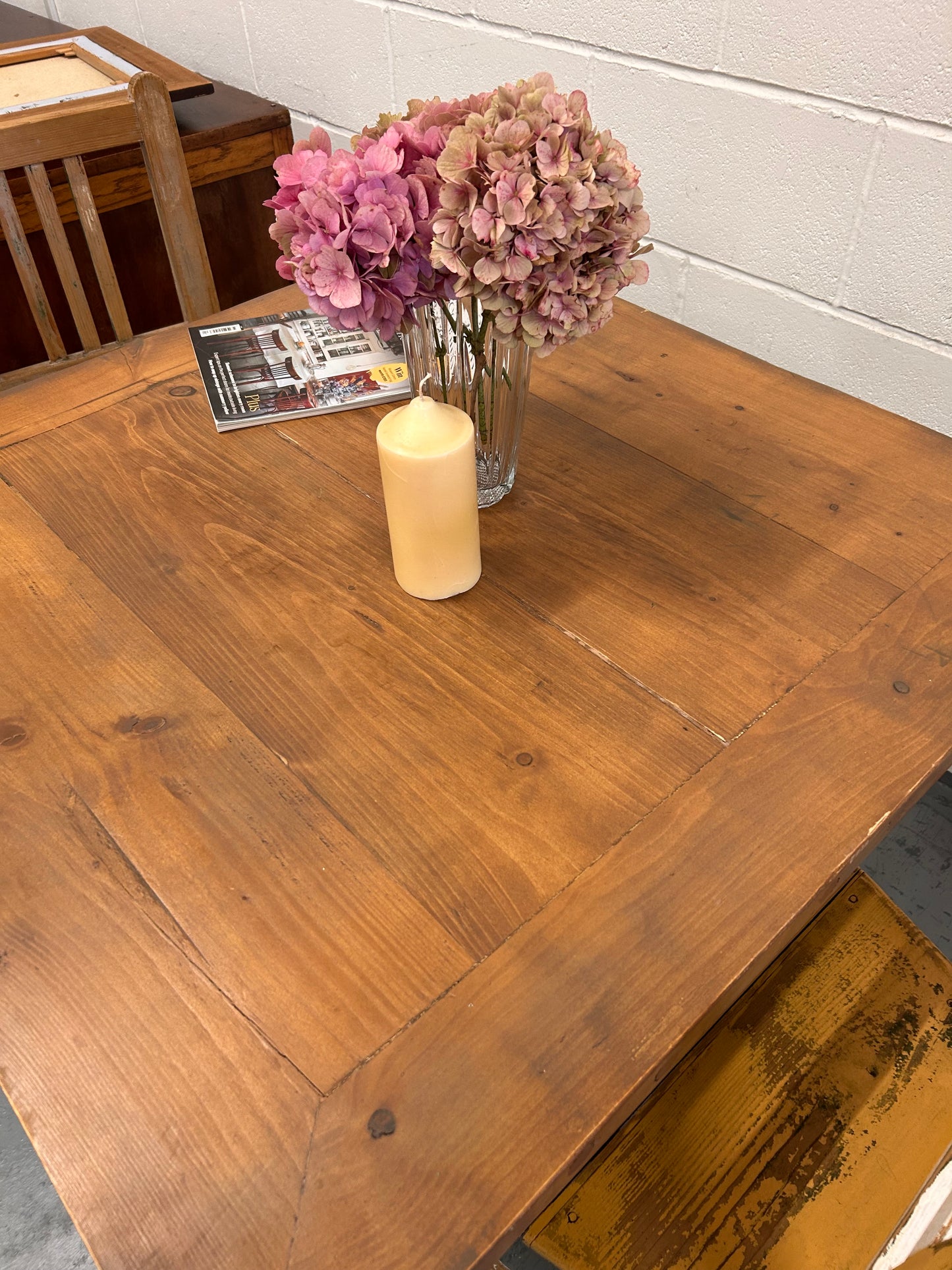 Preloved Rustic four seater table with thick wooden top and black metal base.