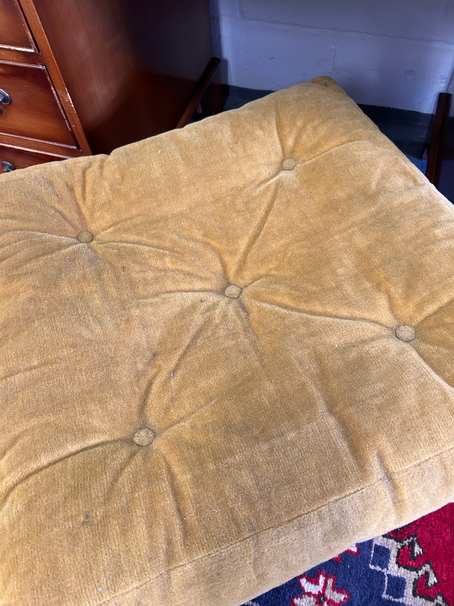 Low Yellow Velvet upholstered button footstool with gilt Yorkshire rose detail