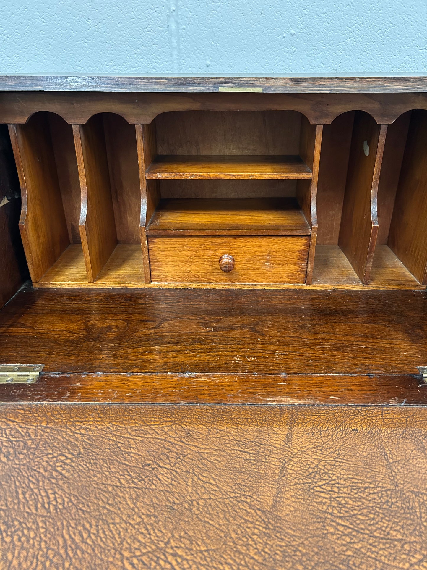 A lovely little vintage compact oak bureau with drop down writing surface and storage