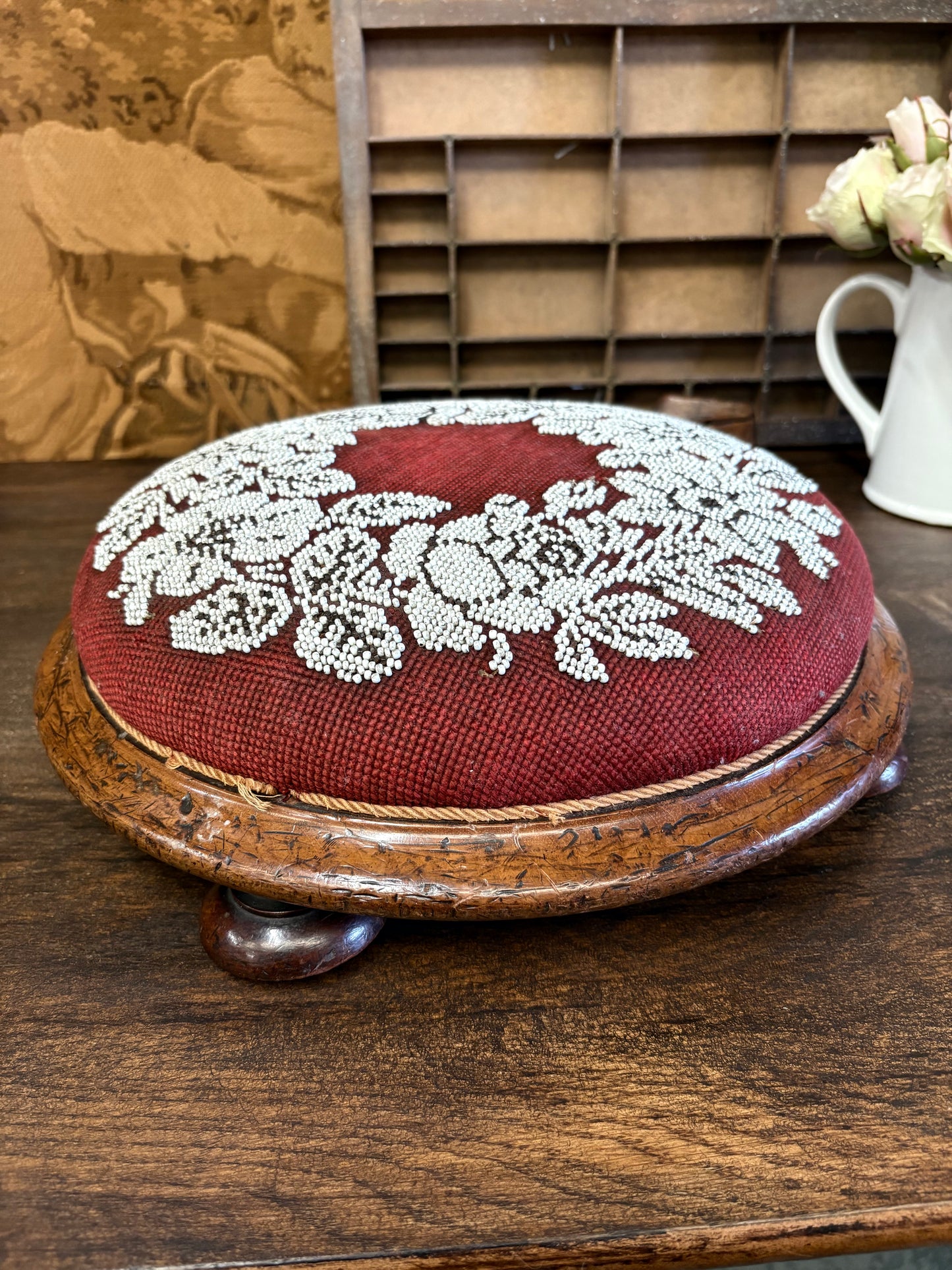 Antique Circular Walnut Beaded Footstool on bun feet