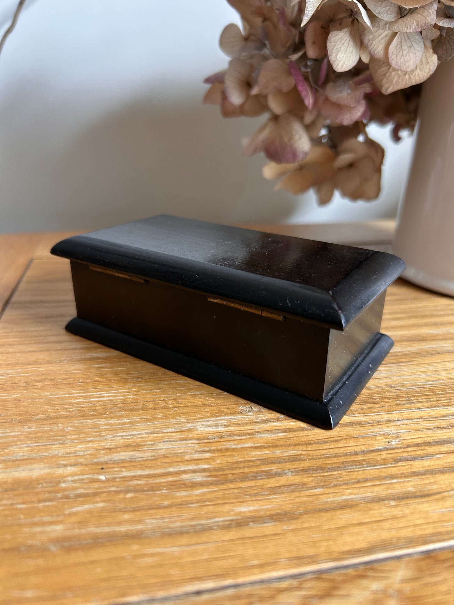 Small vintage black ebonised keepsake box silk lined yellow