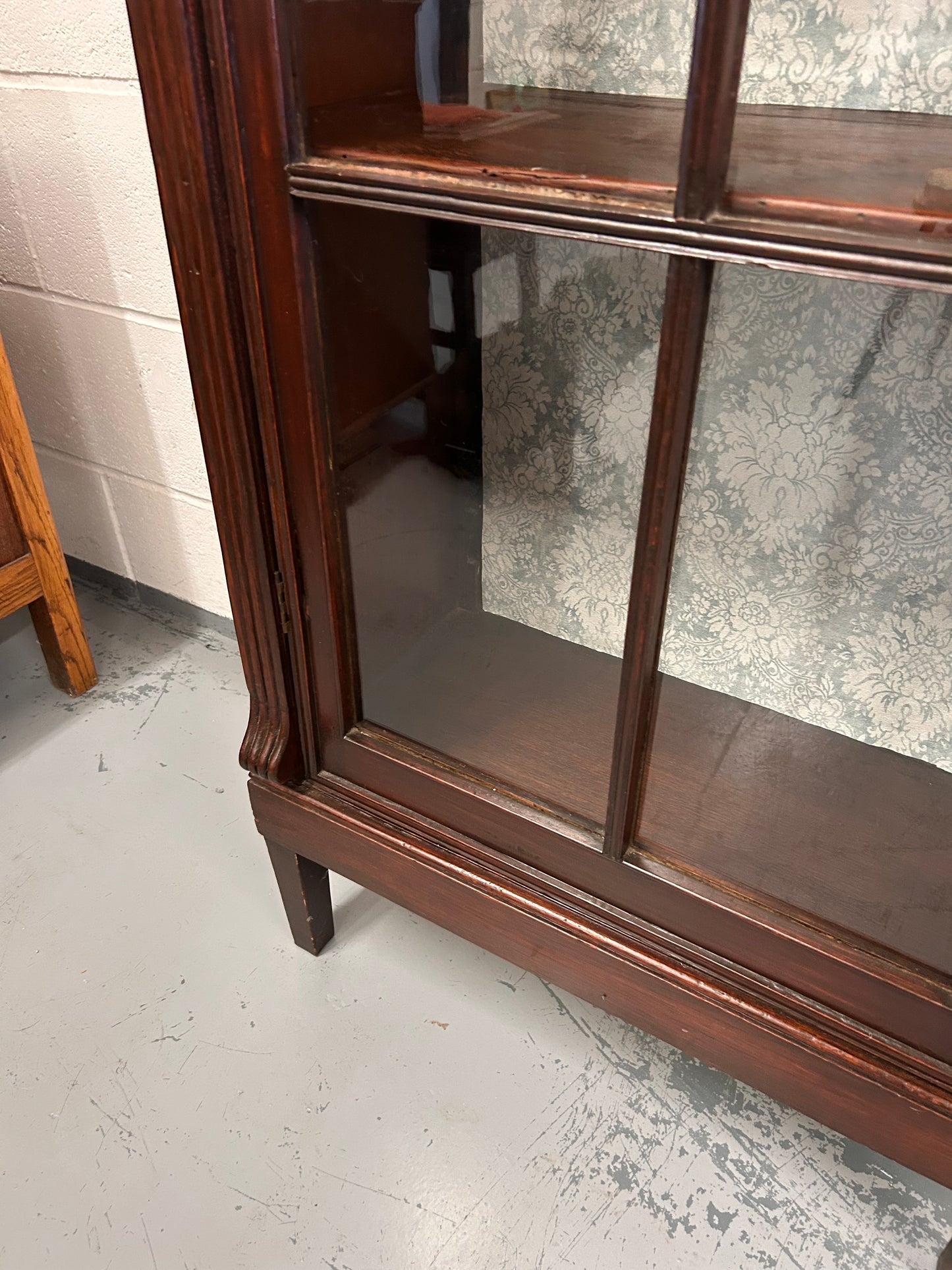 A vintage mahogany display cabinet with a glazed front great condition
