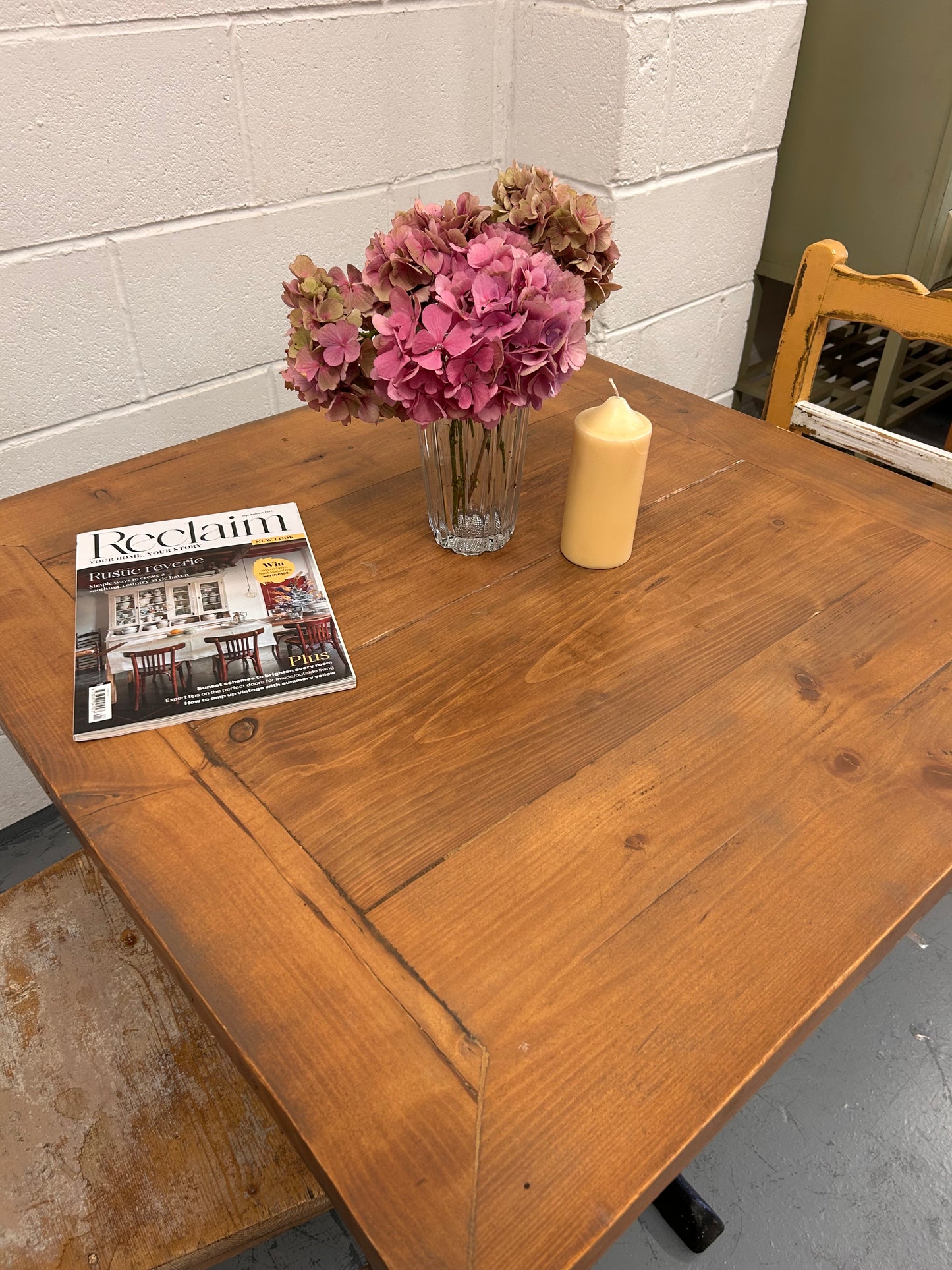 Preloved Rustic four seater table with thick wooden top and black metal base.