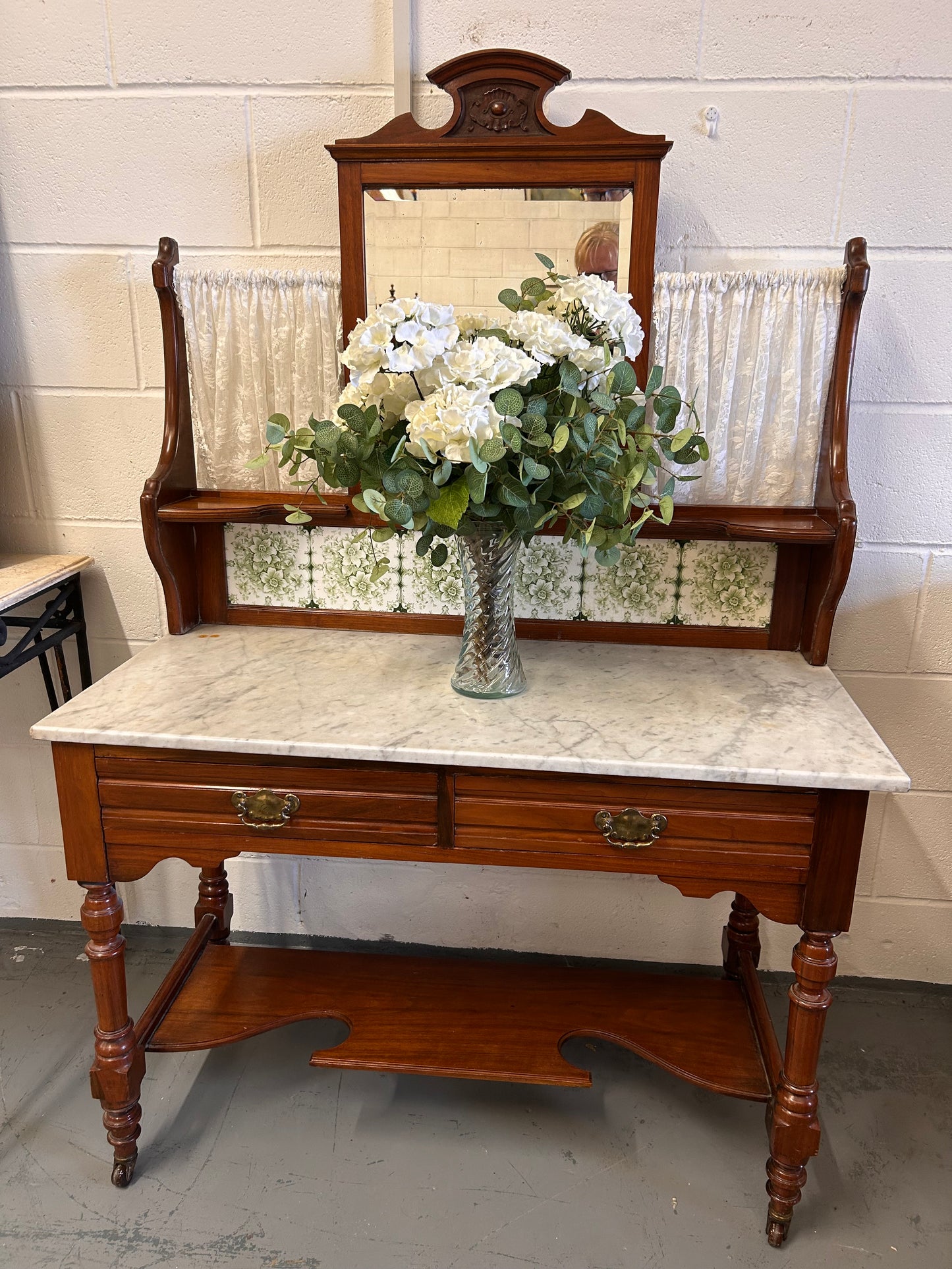 Beautiful washstand from the 1900s with a mirror and marble top tiled back excellent condition