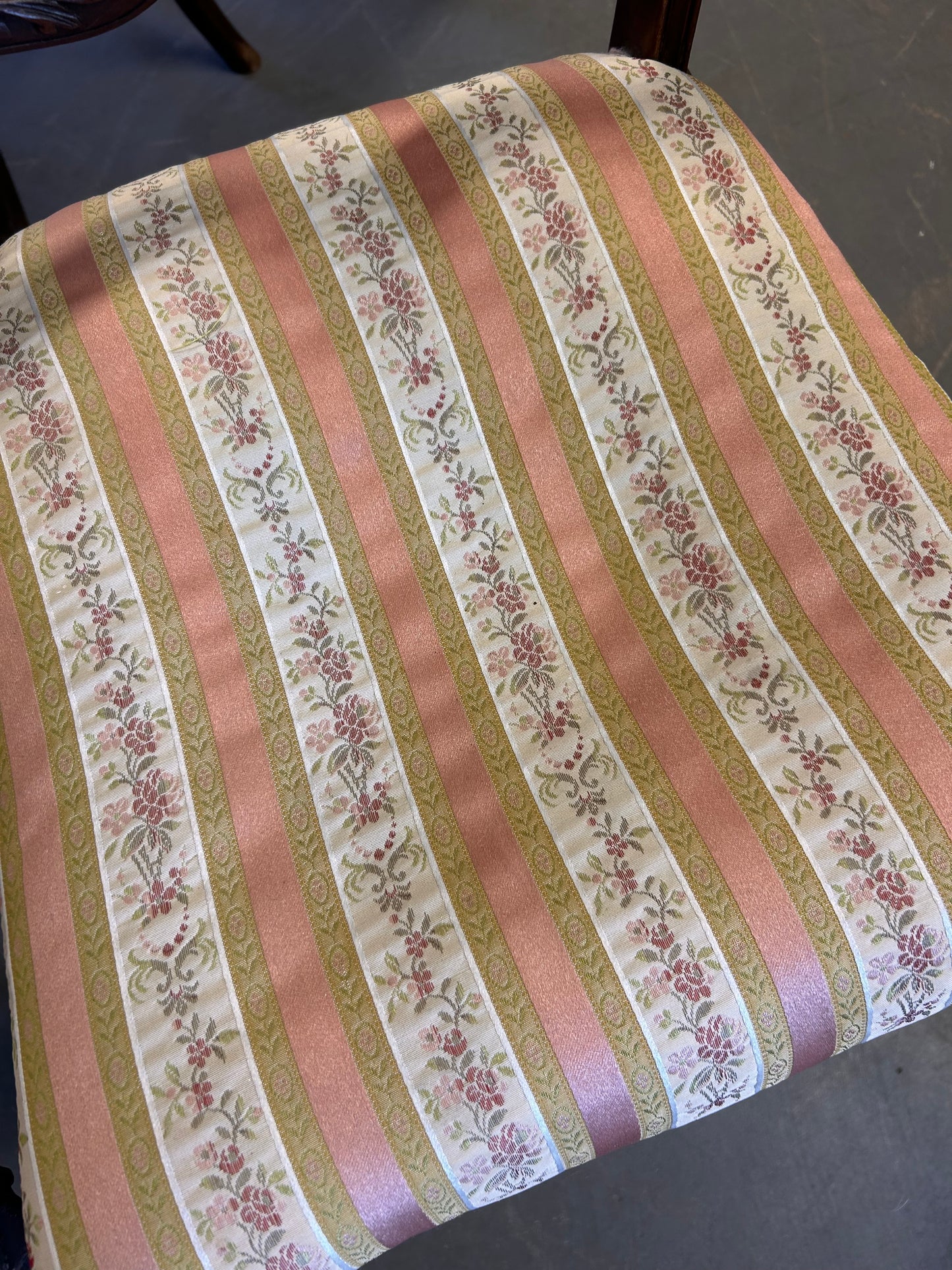 A pair of pretty pink fabric carved wood Edwardian chairs