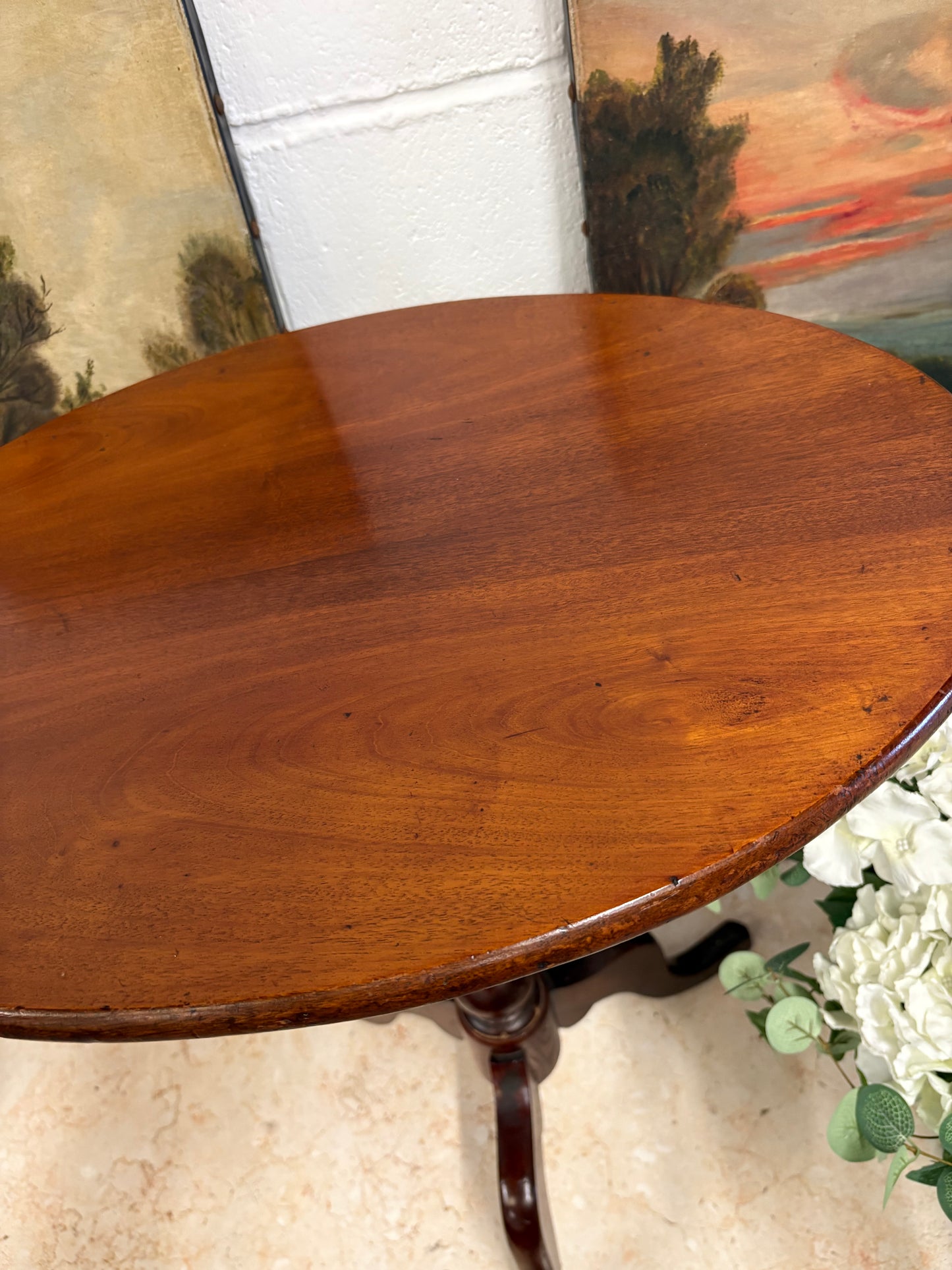 19th century mahogany oval topped occasional table on bobbin support and tripod legs