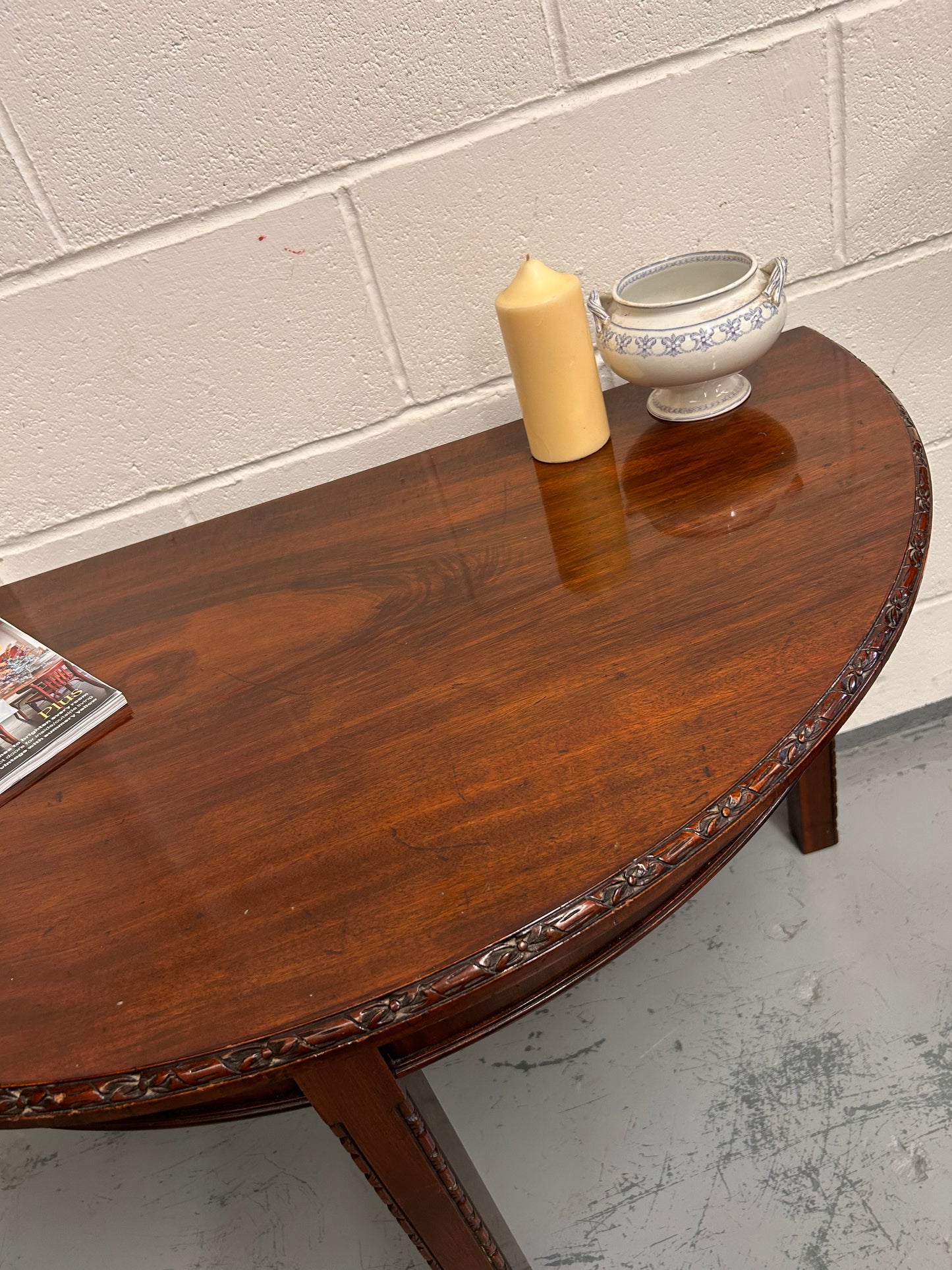 20th century demilune Table with carved edges and opens out to twice the size