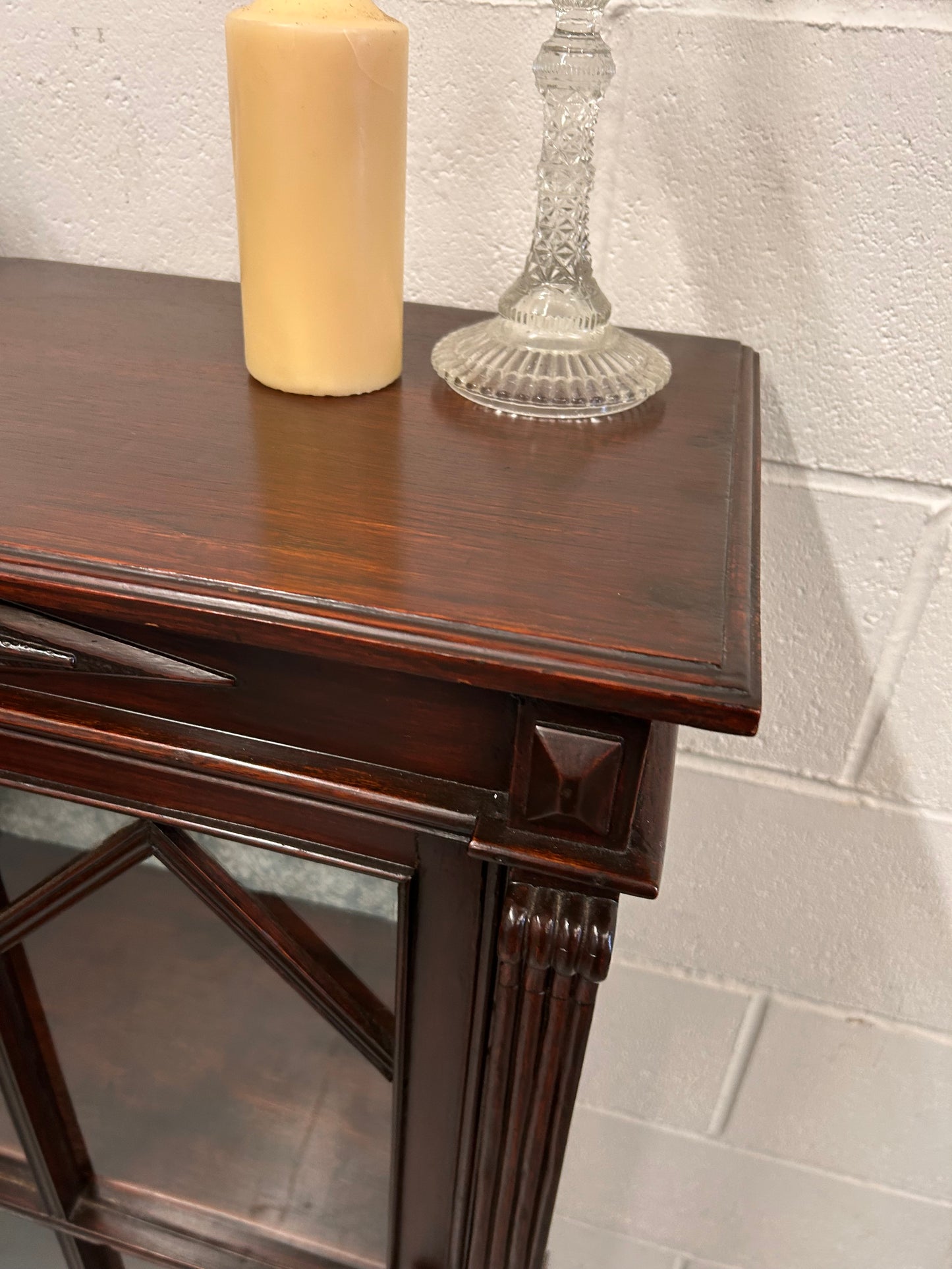 A vintage mahogany display cabinet with a glazed front great condition