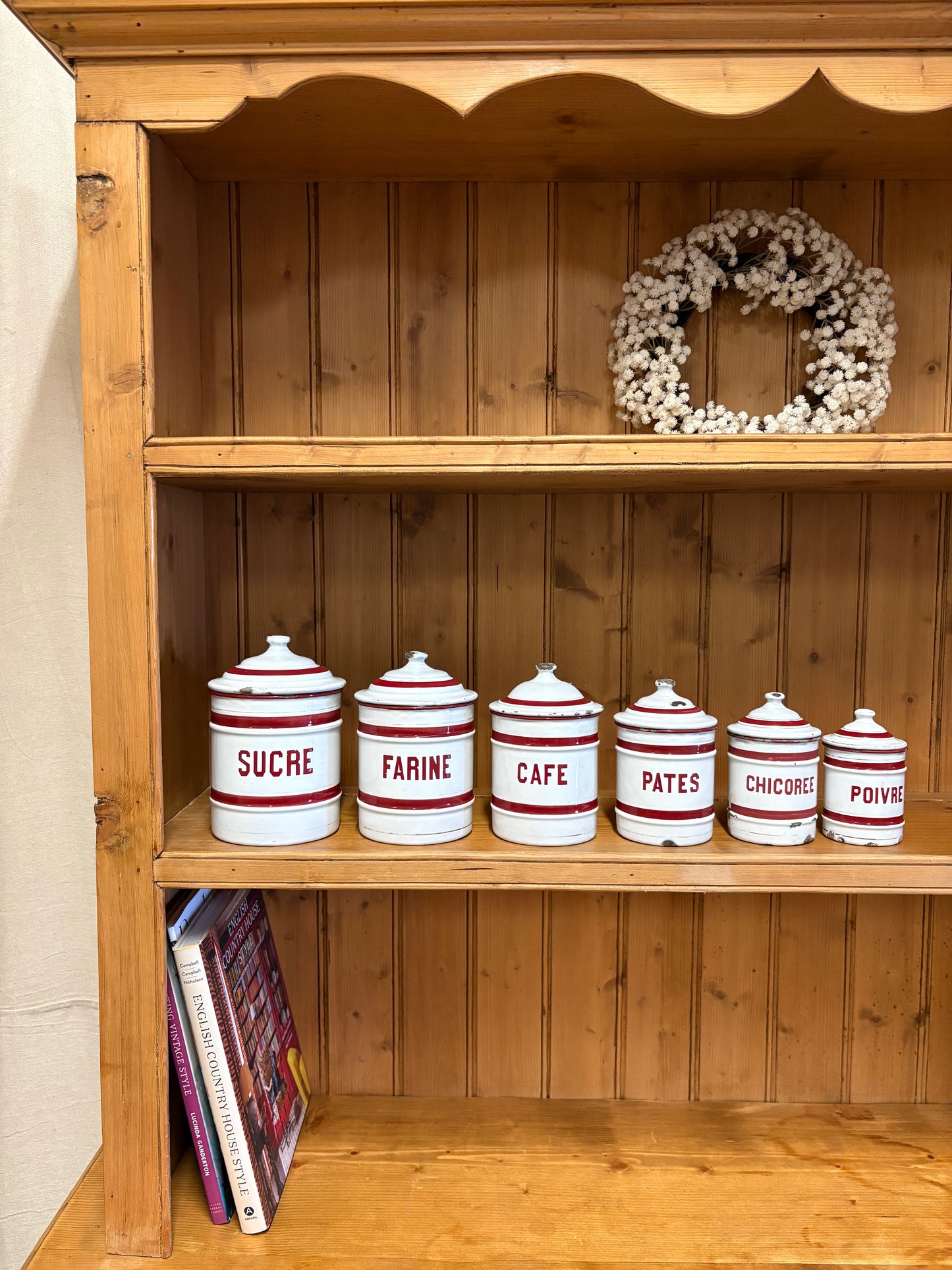 Set of six French Vintage storage canisters, red and white enamel 