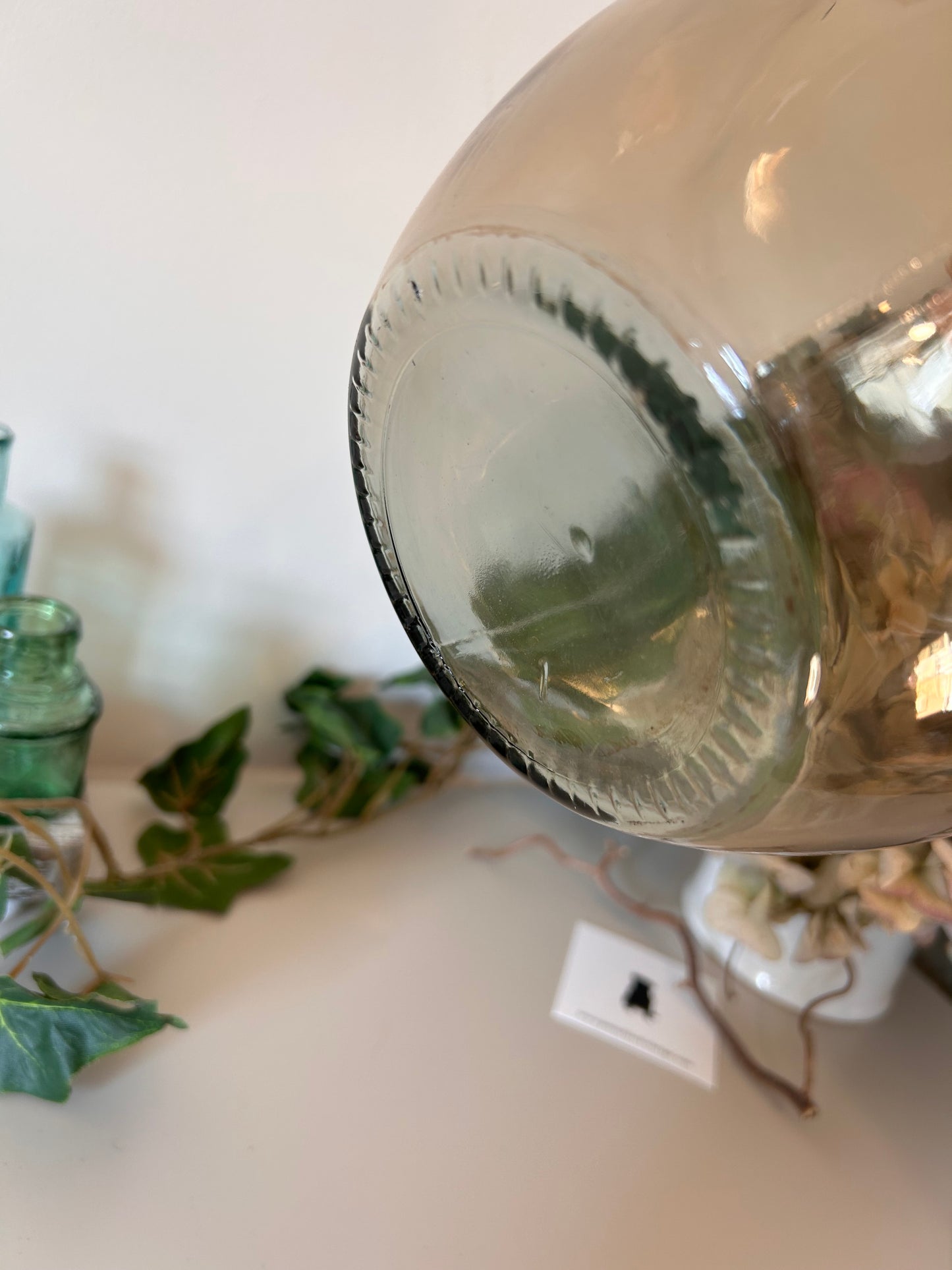 A vintage style amber bottle made from recycled glass