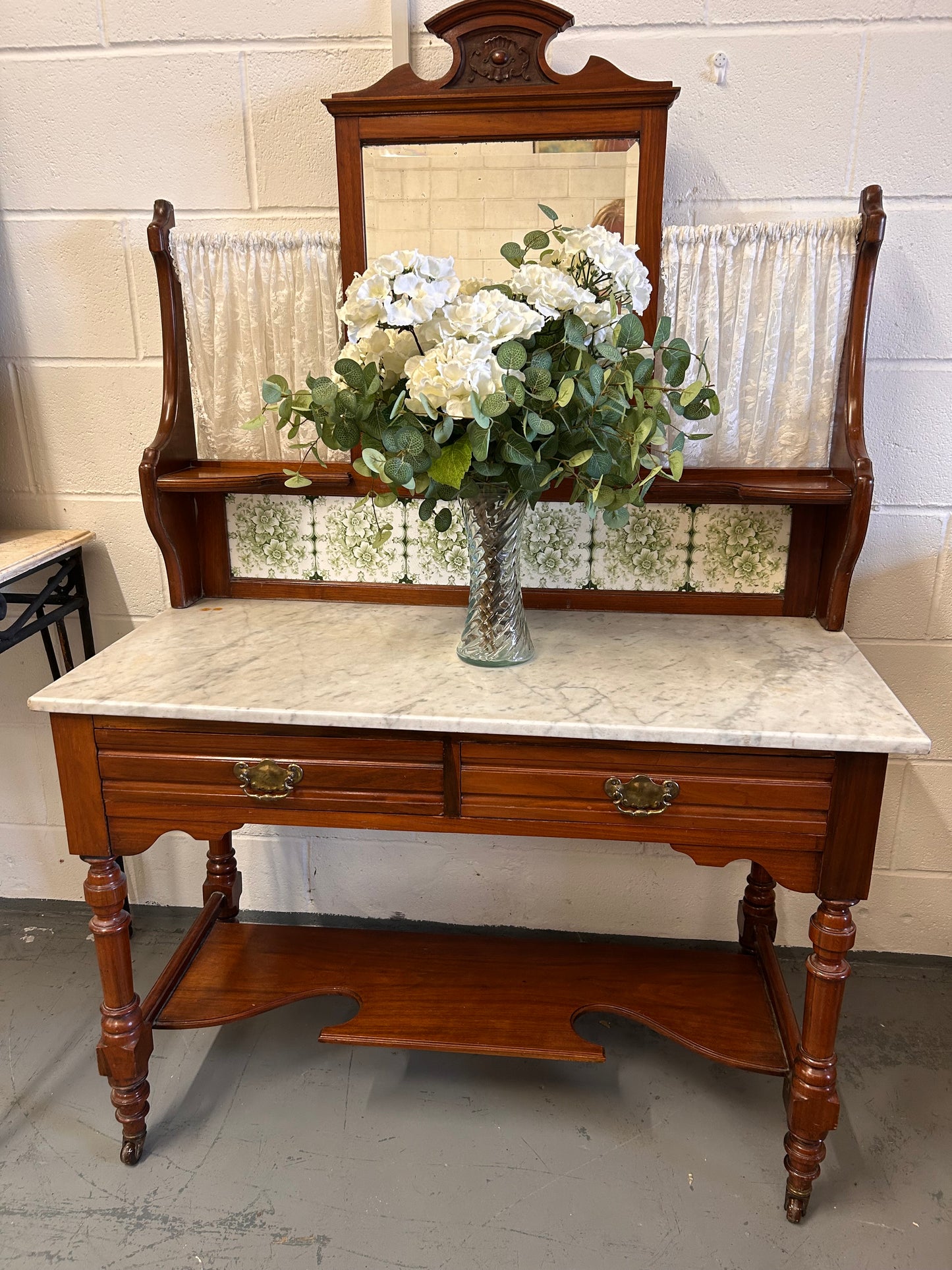 Beautiful washstand from the 1900s with a mirror and marble top tiled back excellent condition