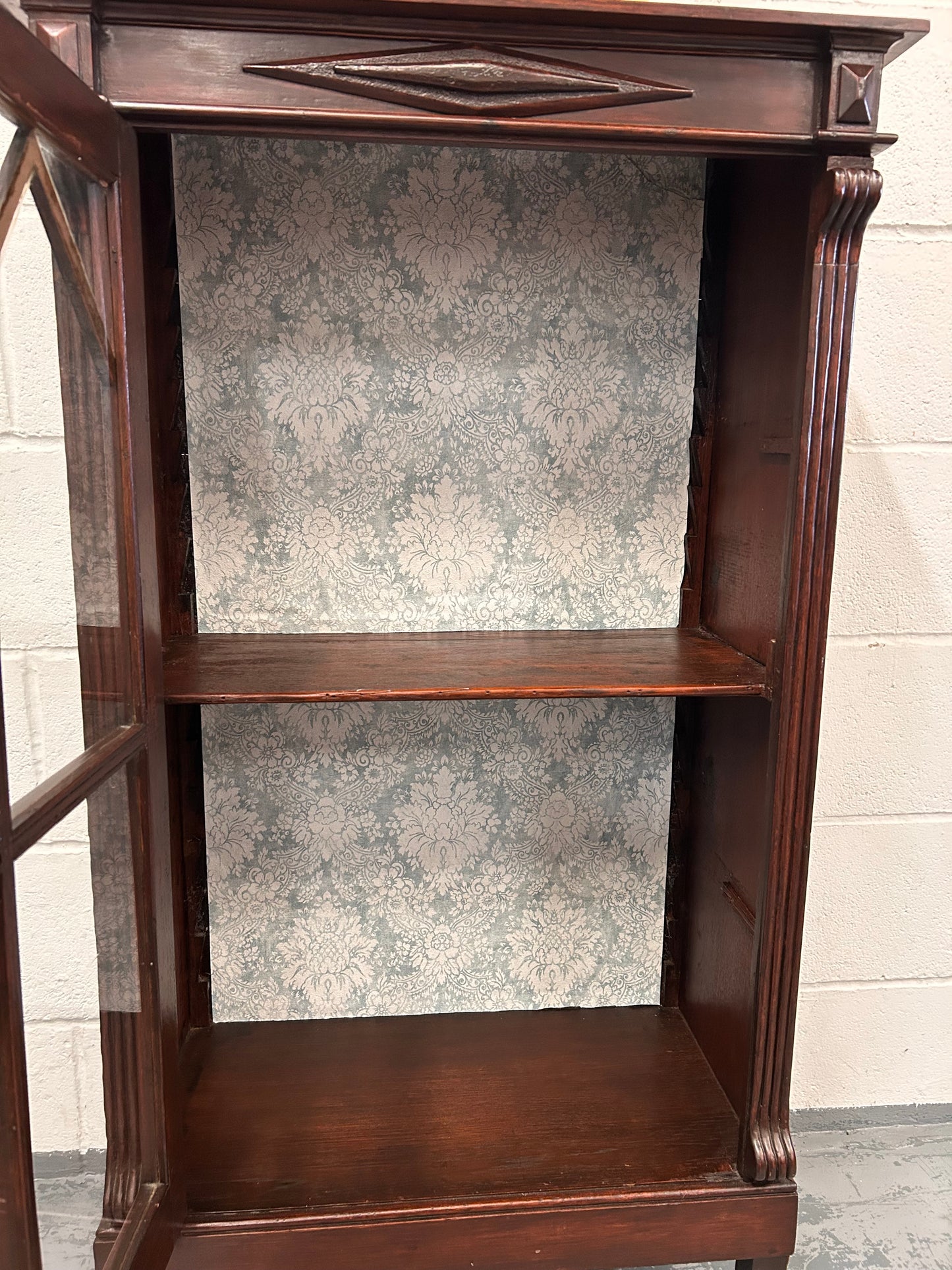 A vintage mahogany display cabinet with a glazed front great condition