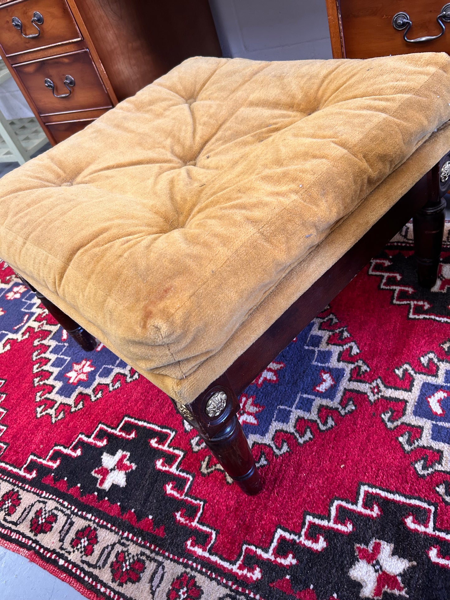 Low Yellow Velvet upholstered button footstool with gilt Yorkshire rose detail