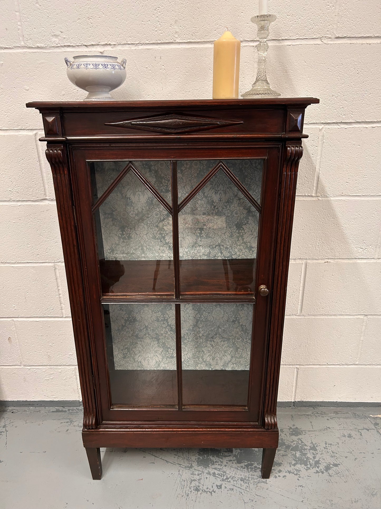 A vintage mahogany display cabinet with a glazed front great condition