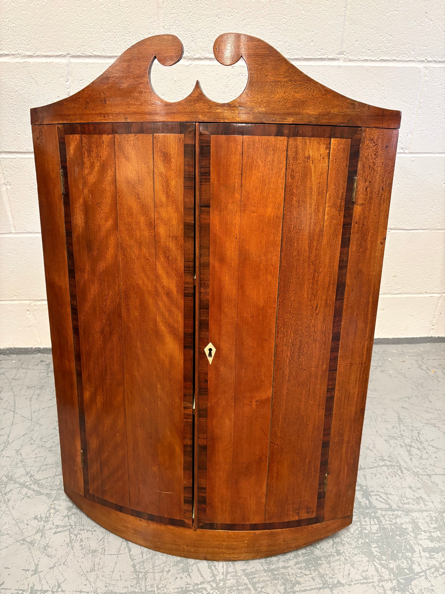 Large Antique Bow Fronted mahogany corner cupboard
