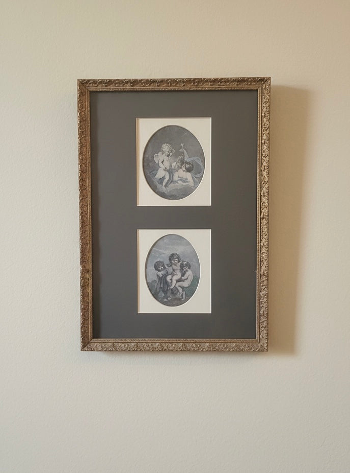 Beautiful vintage cherub putti pictures in an ornate gold gilt frame