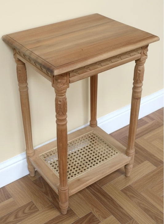 Carved Teak wooden side table with rattan undershelf waxed natural look