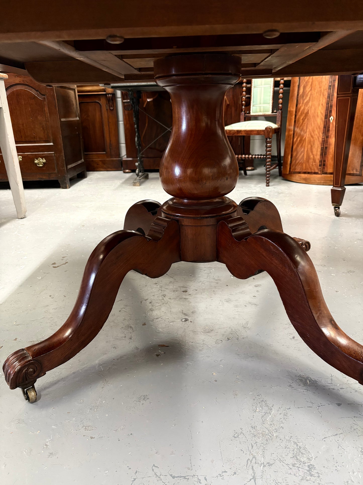 Victorian mahogany centre or dining table, rectangular top with folding action Seats 4