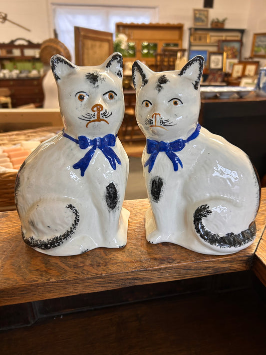 A lovely pair of antique blue white Staffordshire cat figures