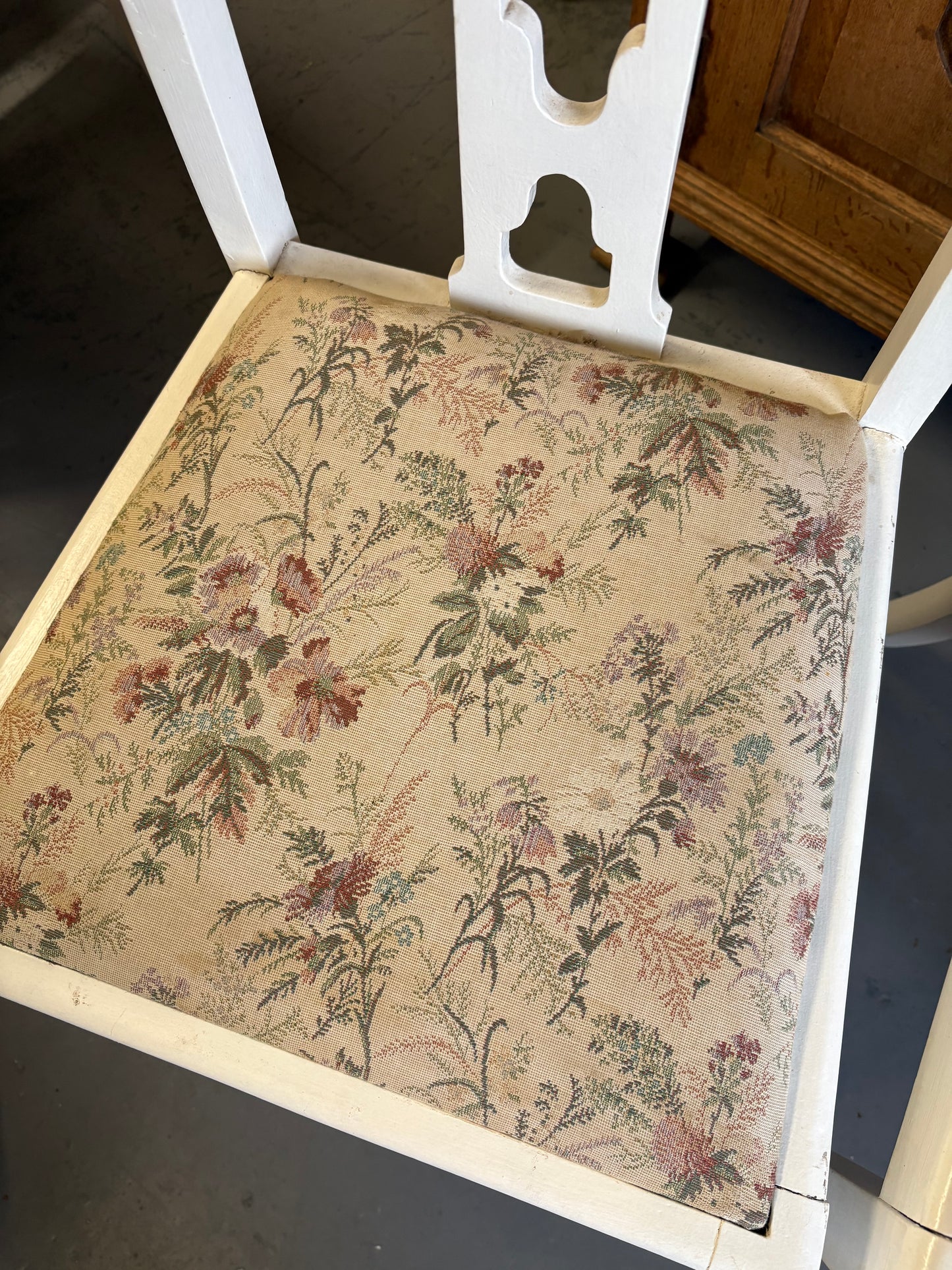 Pair of white fabric covered carved Edwardian occasional or bedroom chairs