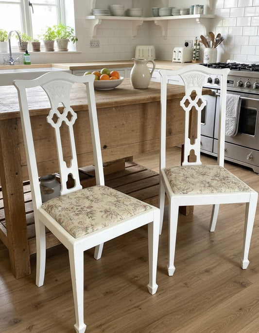 Pair of white fabric covered carved Edwardian occasional or bedroom chairs