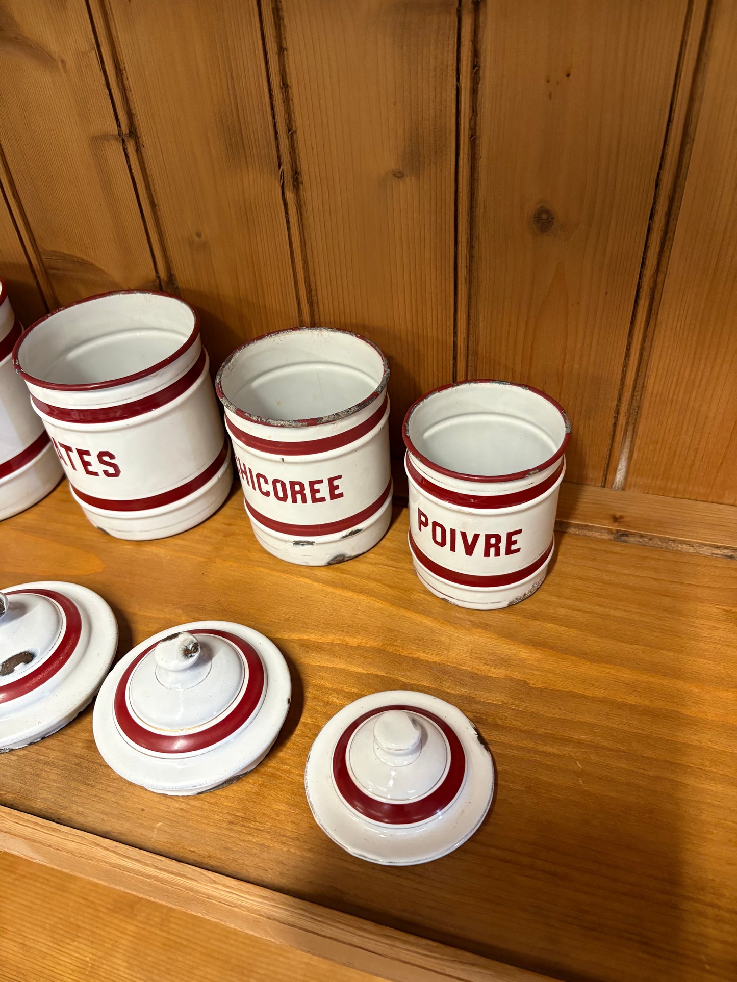 Set of six French Vintage storage canisters, red and white enamel ￼