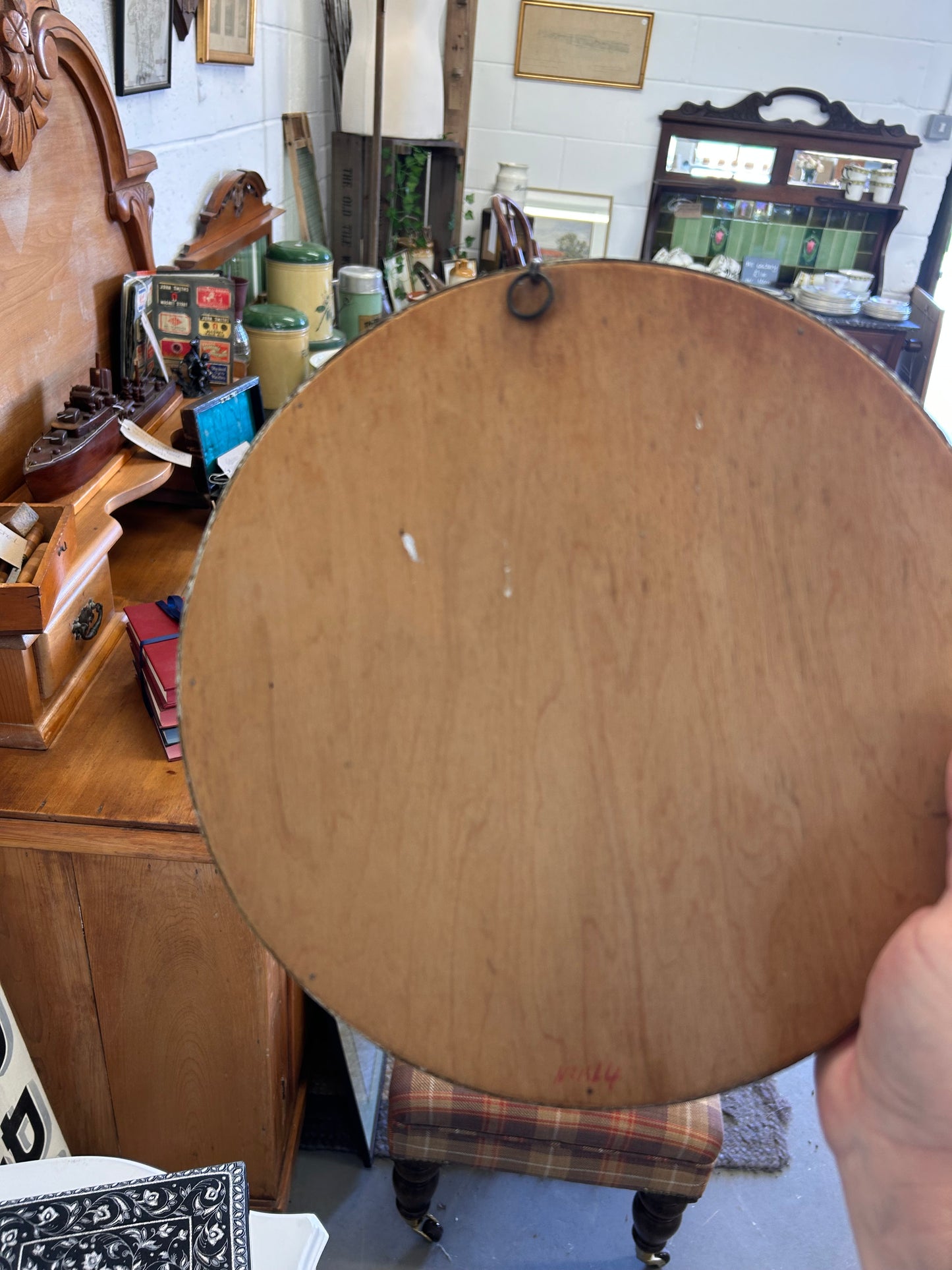 Fabulous circular convex mid-century gilt framed mirror.