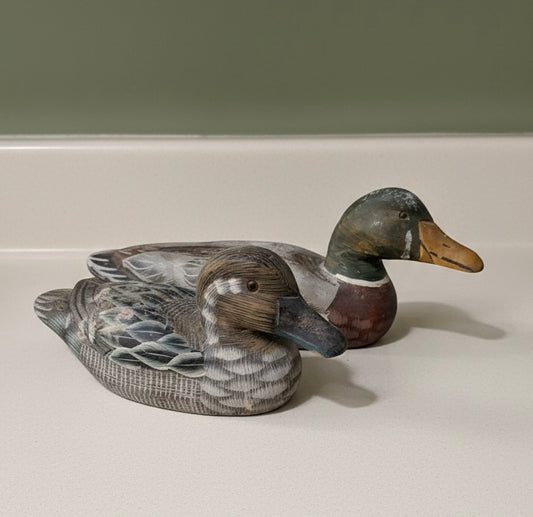 A pair of vintage decorative painted wooden mallard ducks, male and female