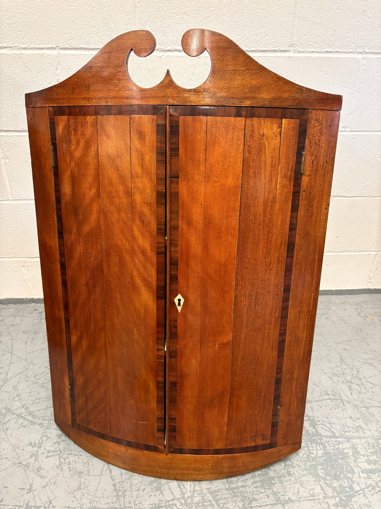 Large Antique Bow Fronted mahogany corner cupboard
