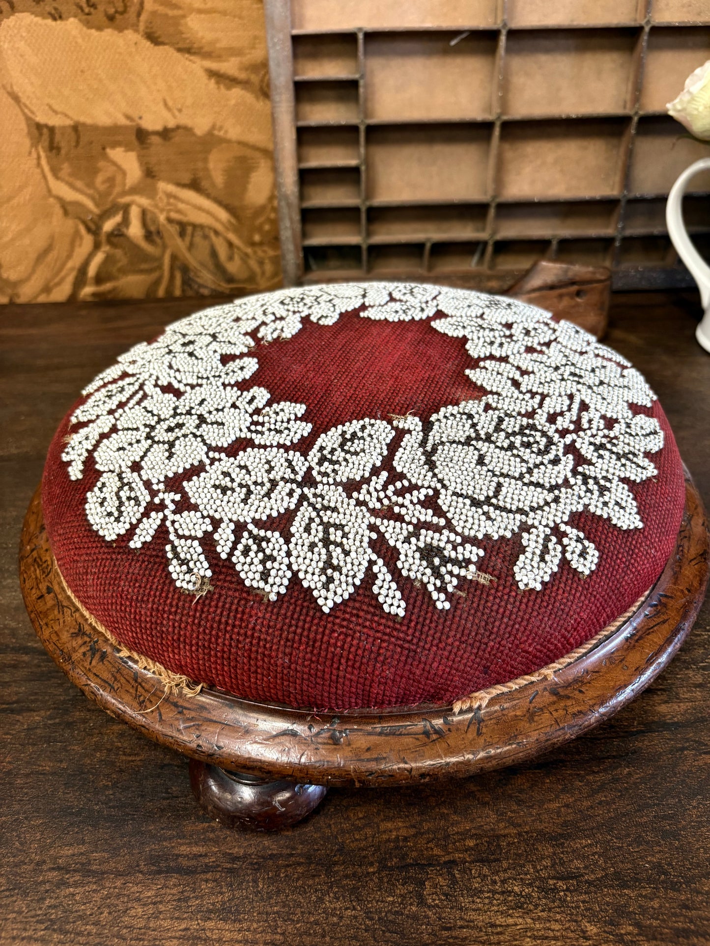Antique Circular Walnut Beaded Footstool on bun feet