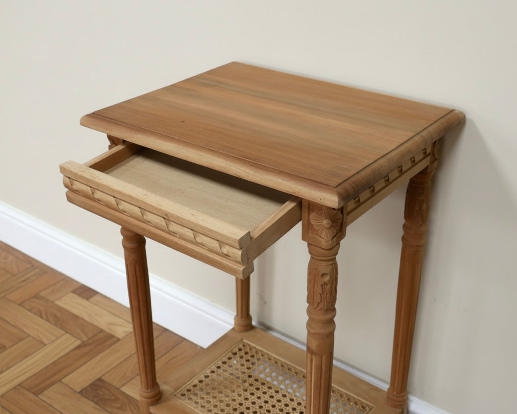 Carved Teak wooden side table with rattan undershelf waxed natural look