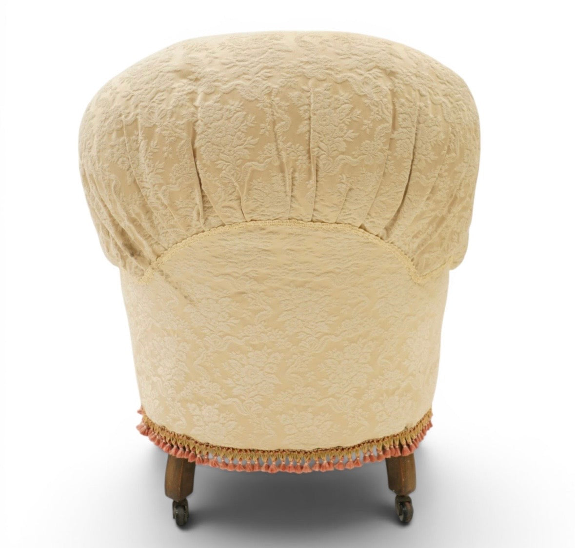 Victorian Antique button-back nursing chair with cream floral damask fabric on castors