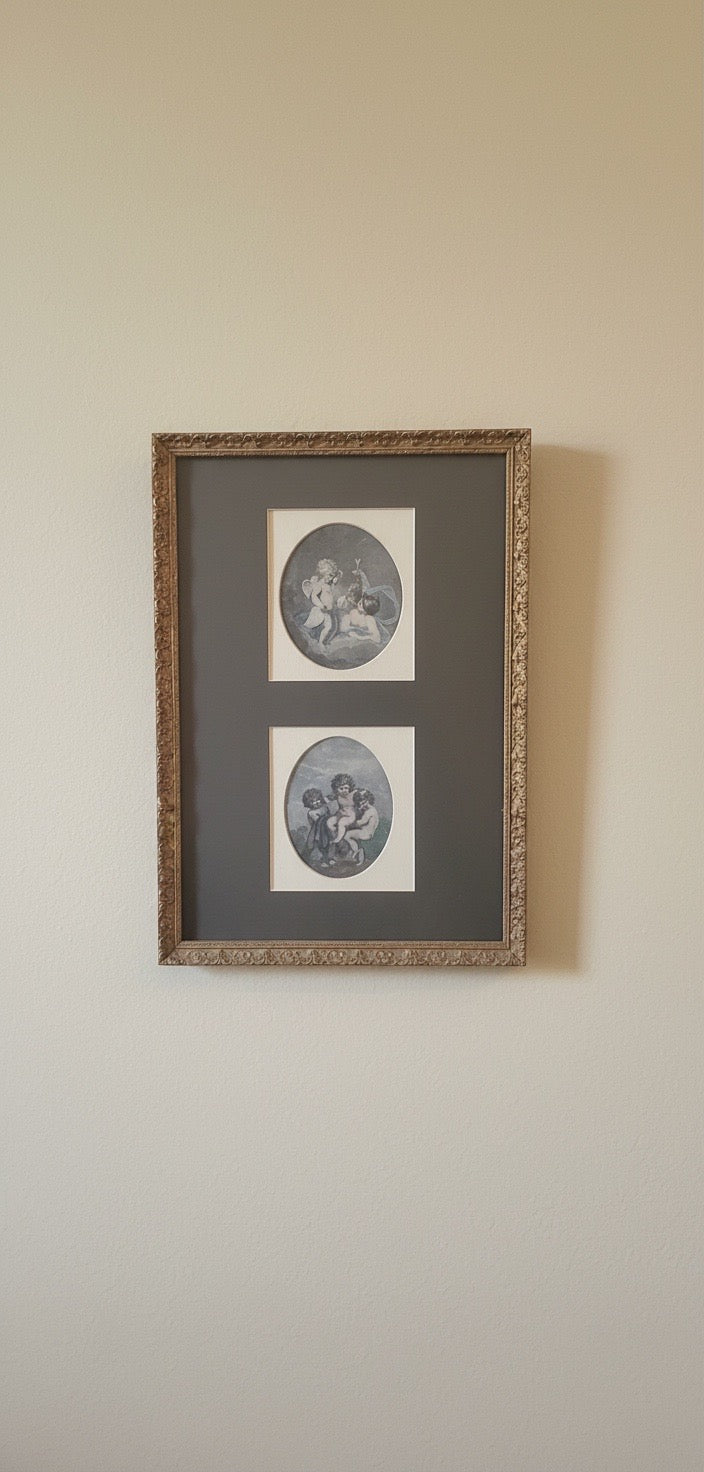 Beautiful vintage cherub putti pictures in an ornate gold gilt frame
