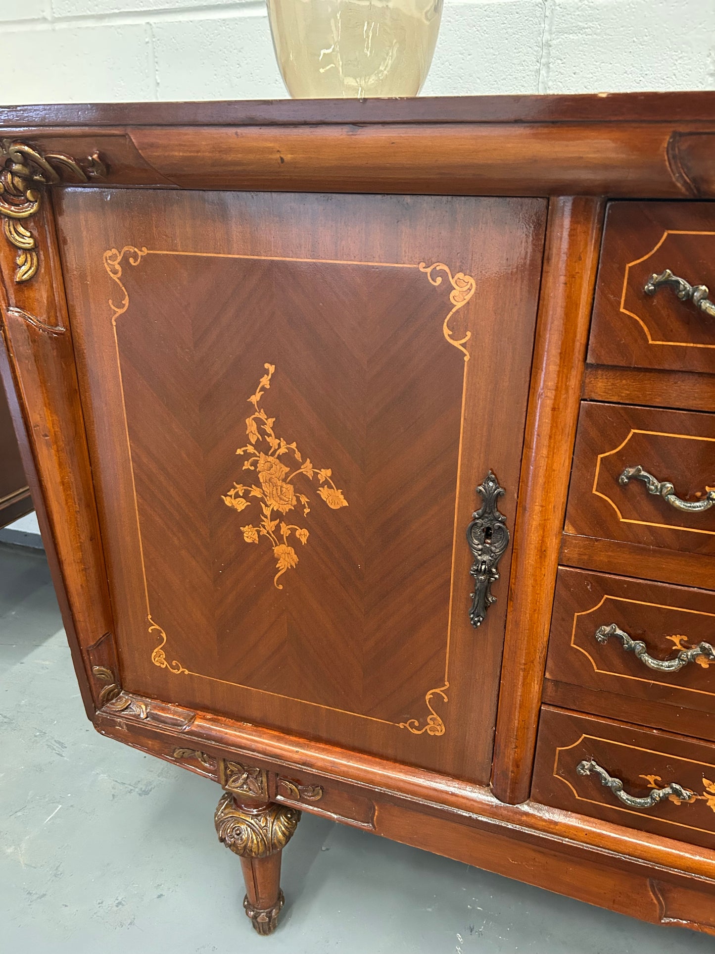 A Vintage French Inlaid sideboard with 4 drawers and 2 cupboards