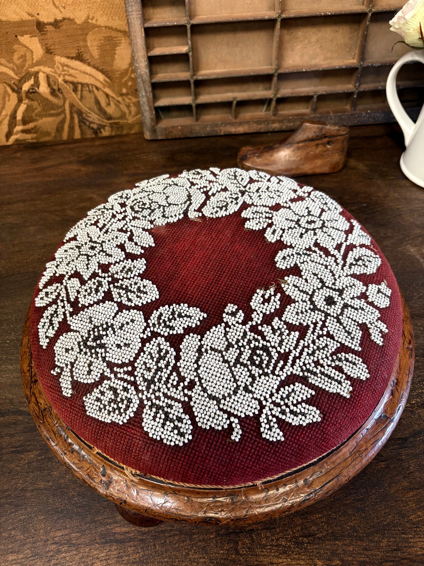 Antique Circular Walnut Beaded Footstool on bun feet