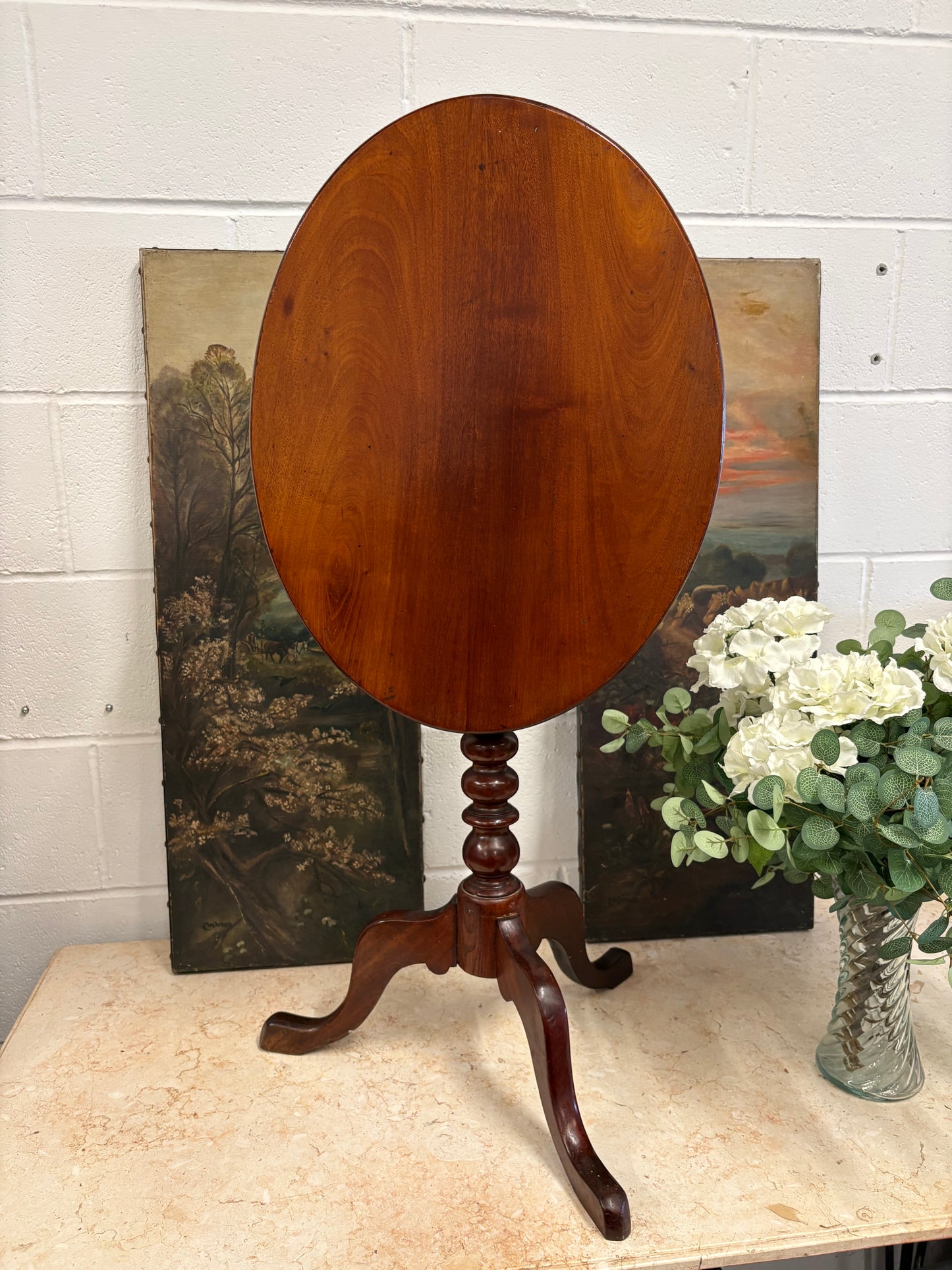 19th century mahogany oval topped occasional table on bobbin support and tripod legs