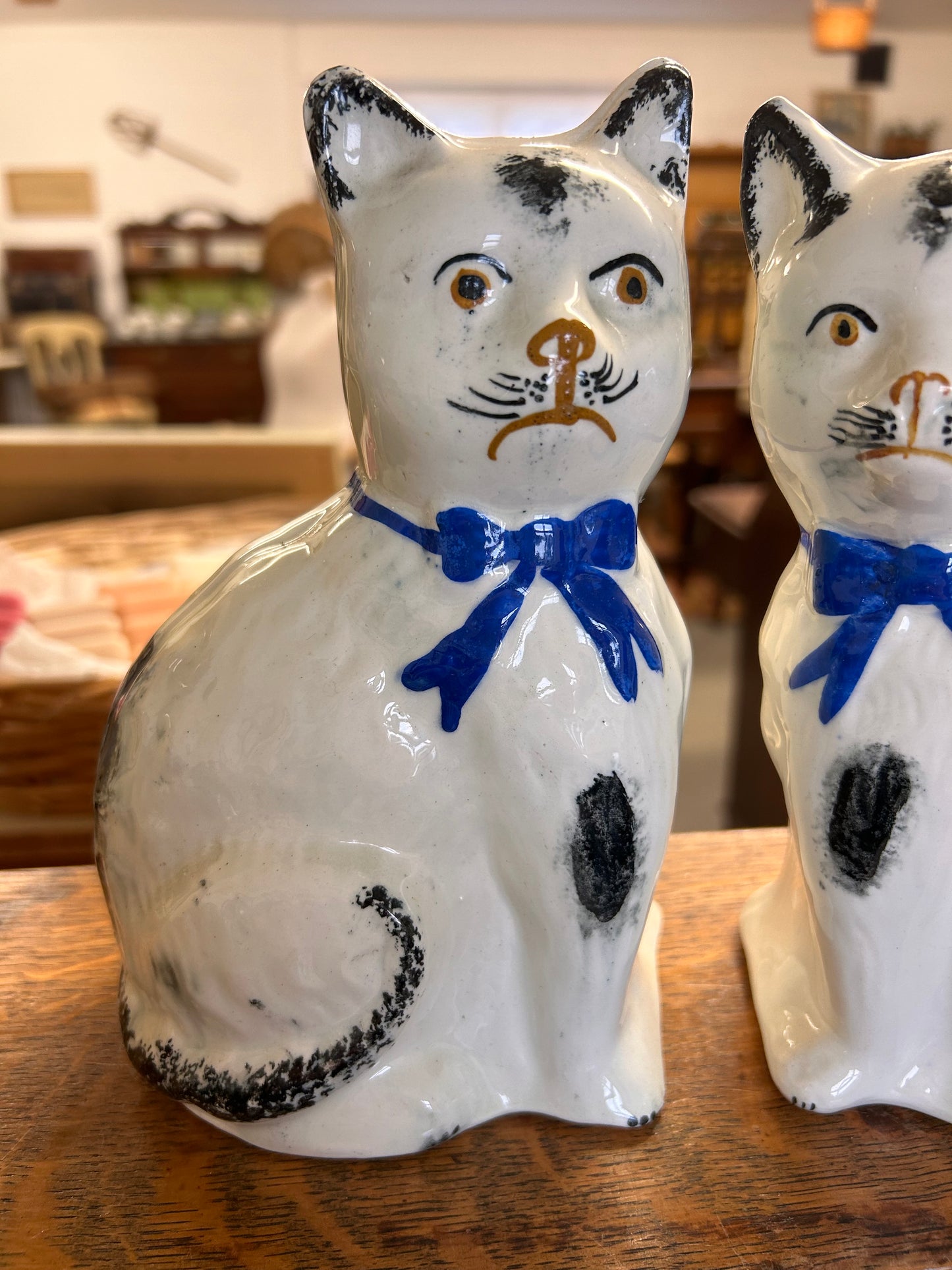 A lovely pair of antique blue white Staffordshire cat figures