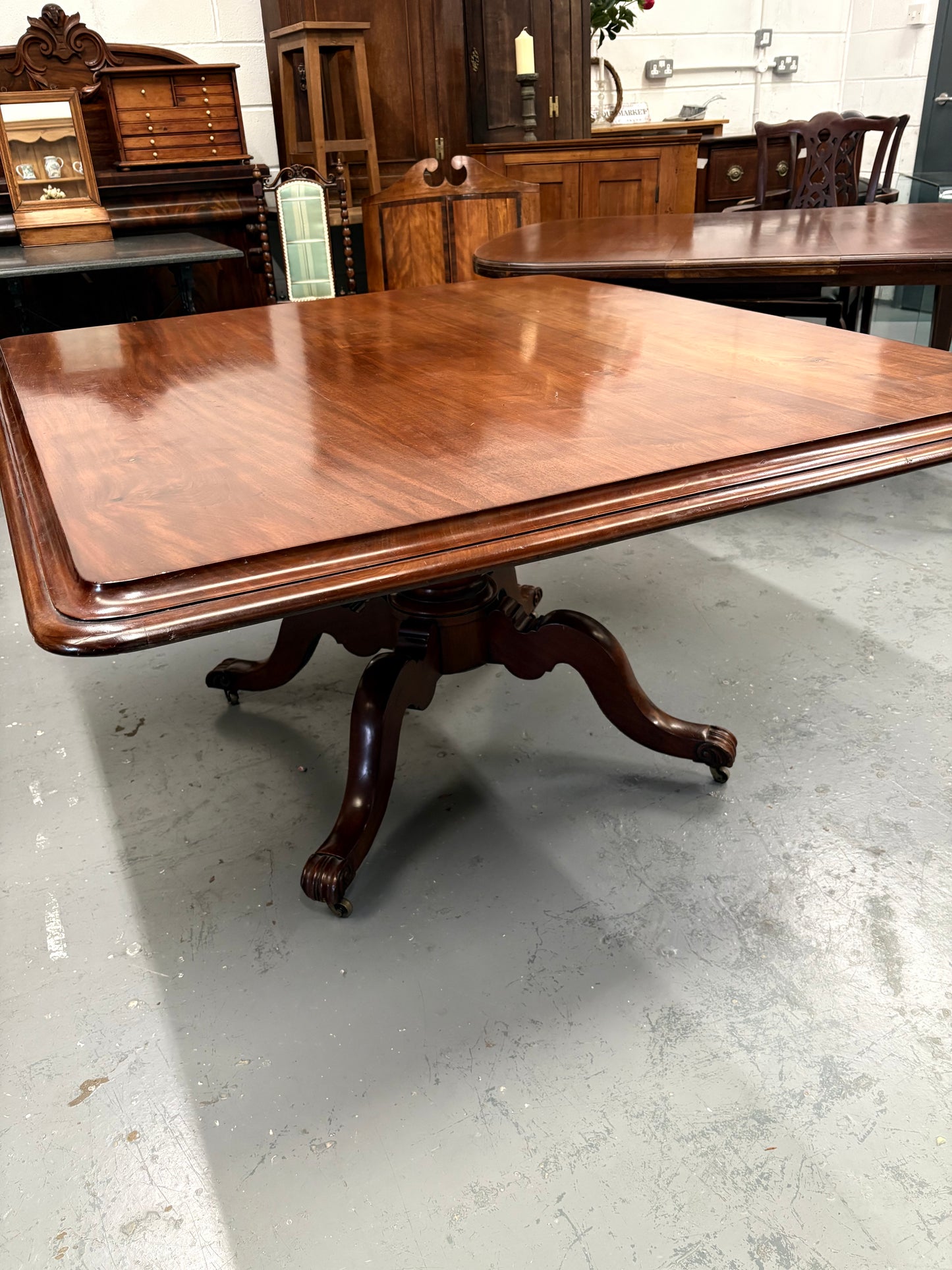 Victorian mahogany centre or dining table, rectangular top with folding action Seats 4