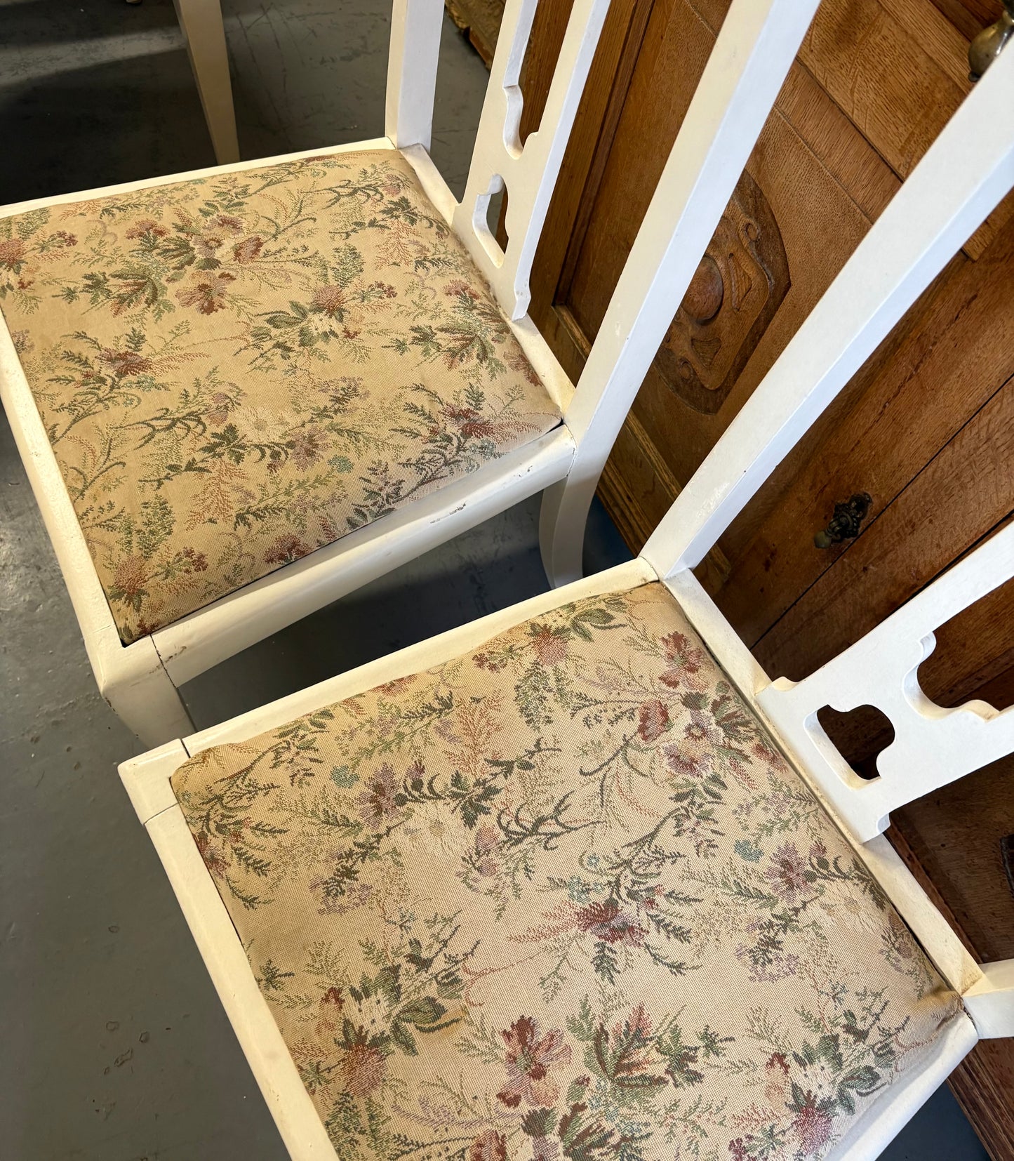 Pair of white fabric covered carved Edwardian occasional or bedroom chairs