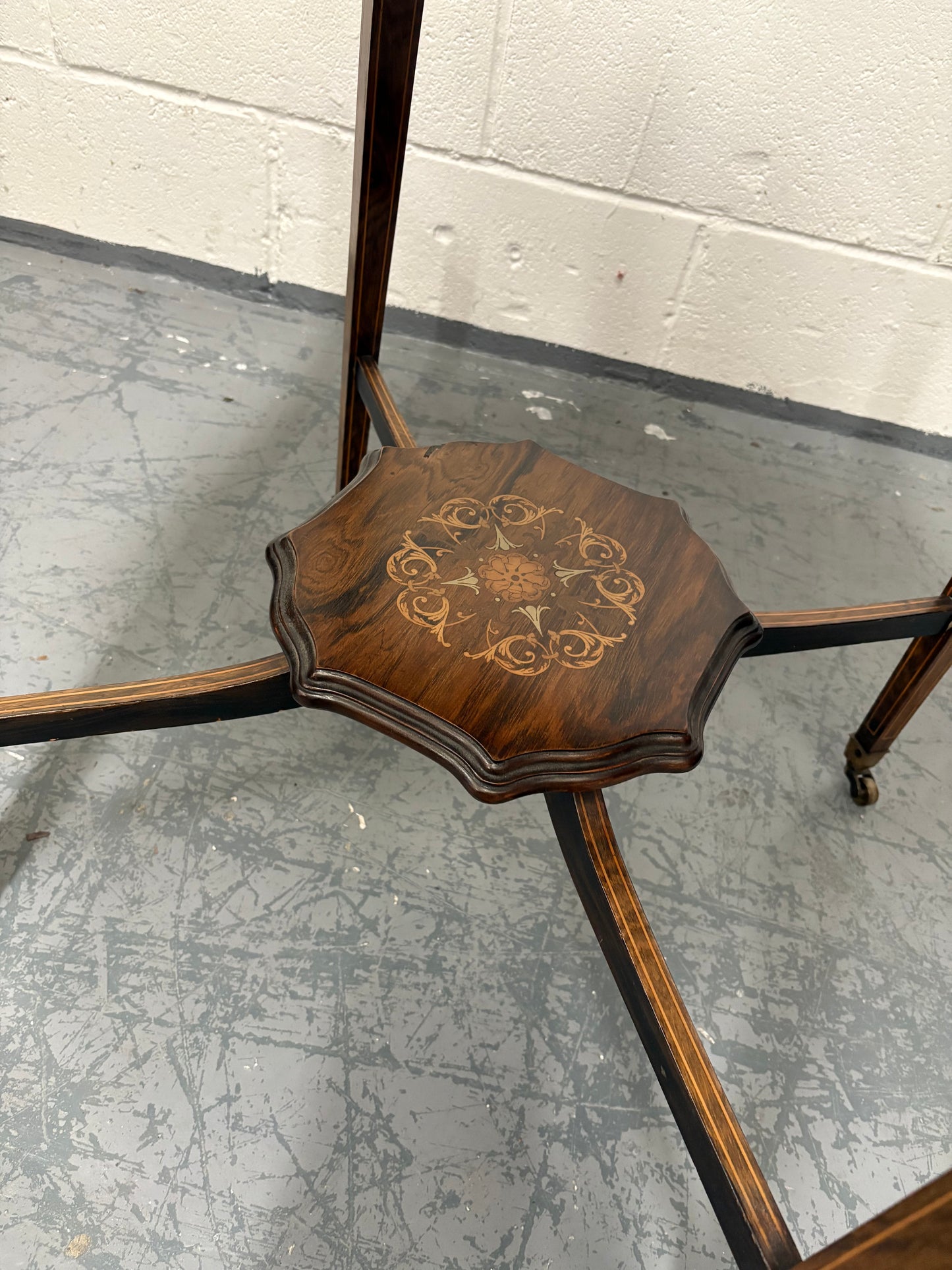 Edwardian inlaid rosewood centre table, octagonal top, square taper legs and undertier