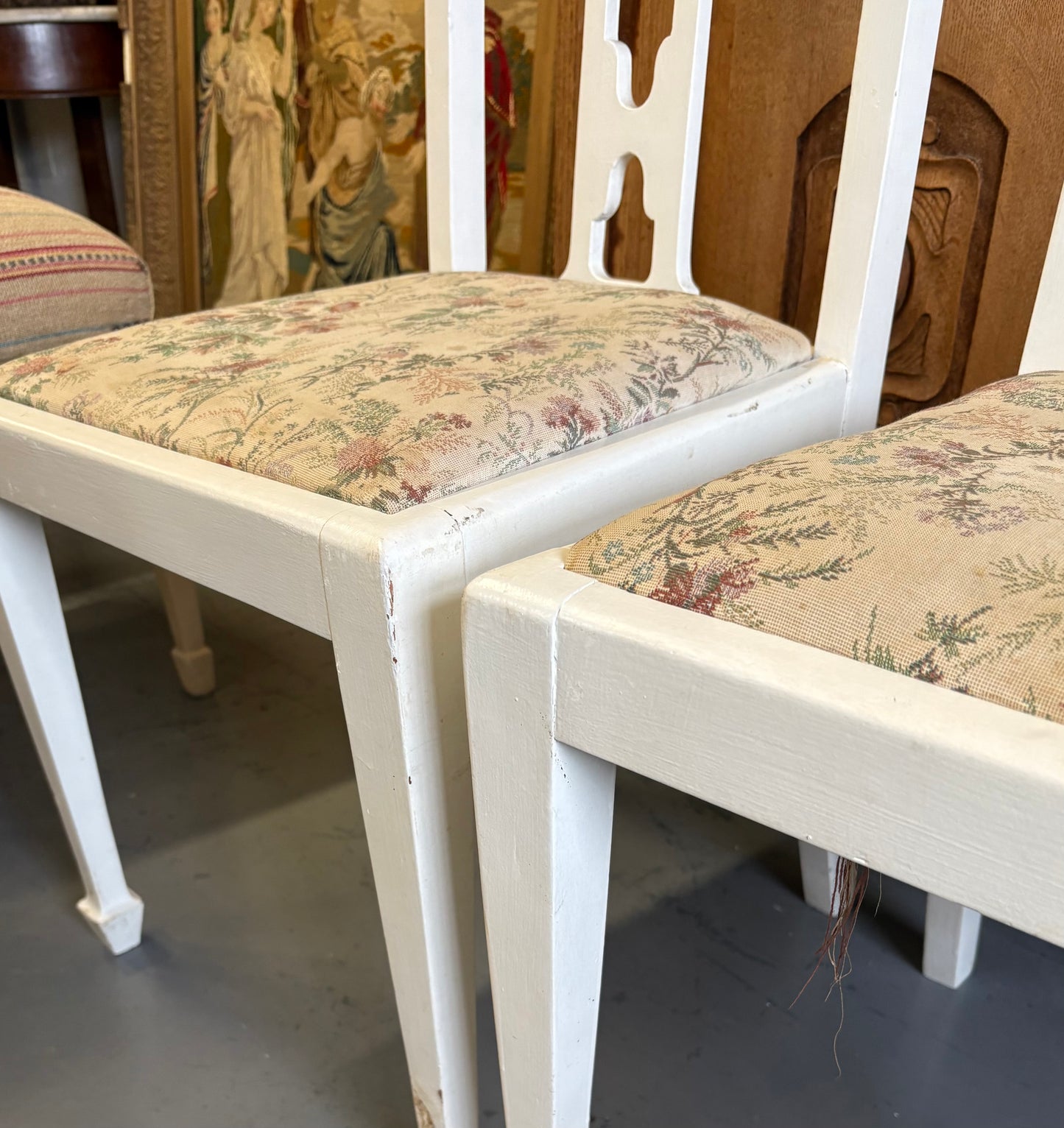 Pair of white fabric covered carved Edwardian occasional or bedroom chairs