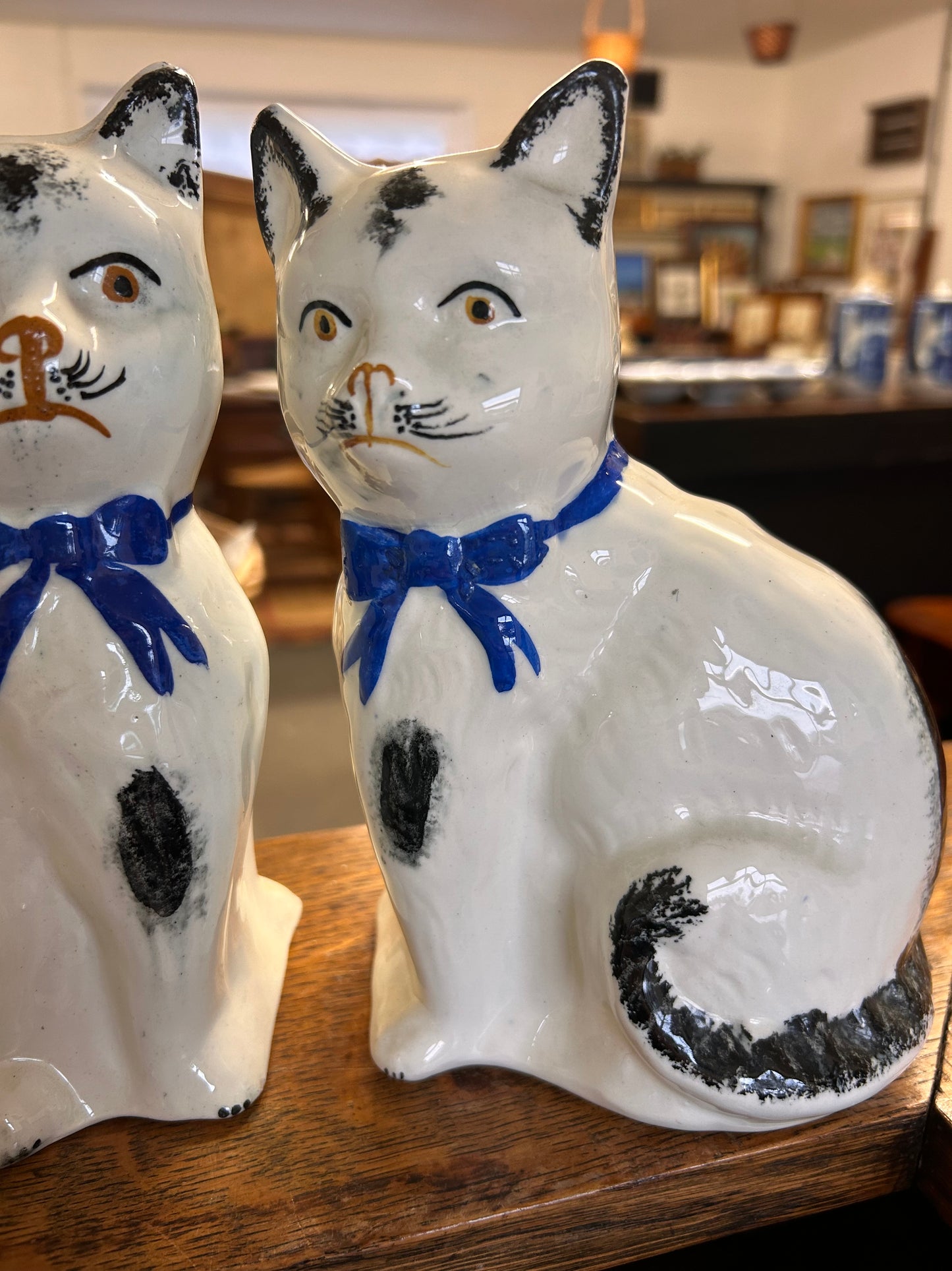 A lovely pair of antique blue white Staffordshire cat figures