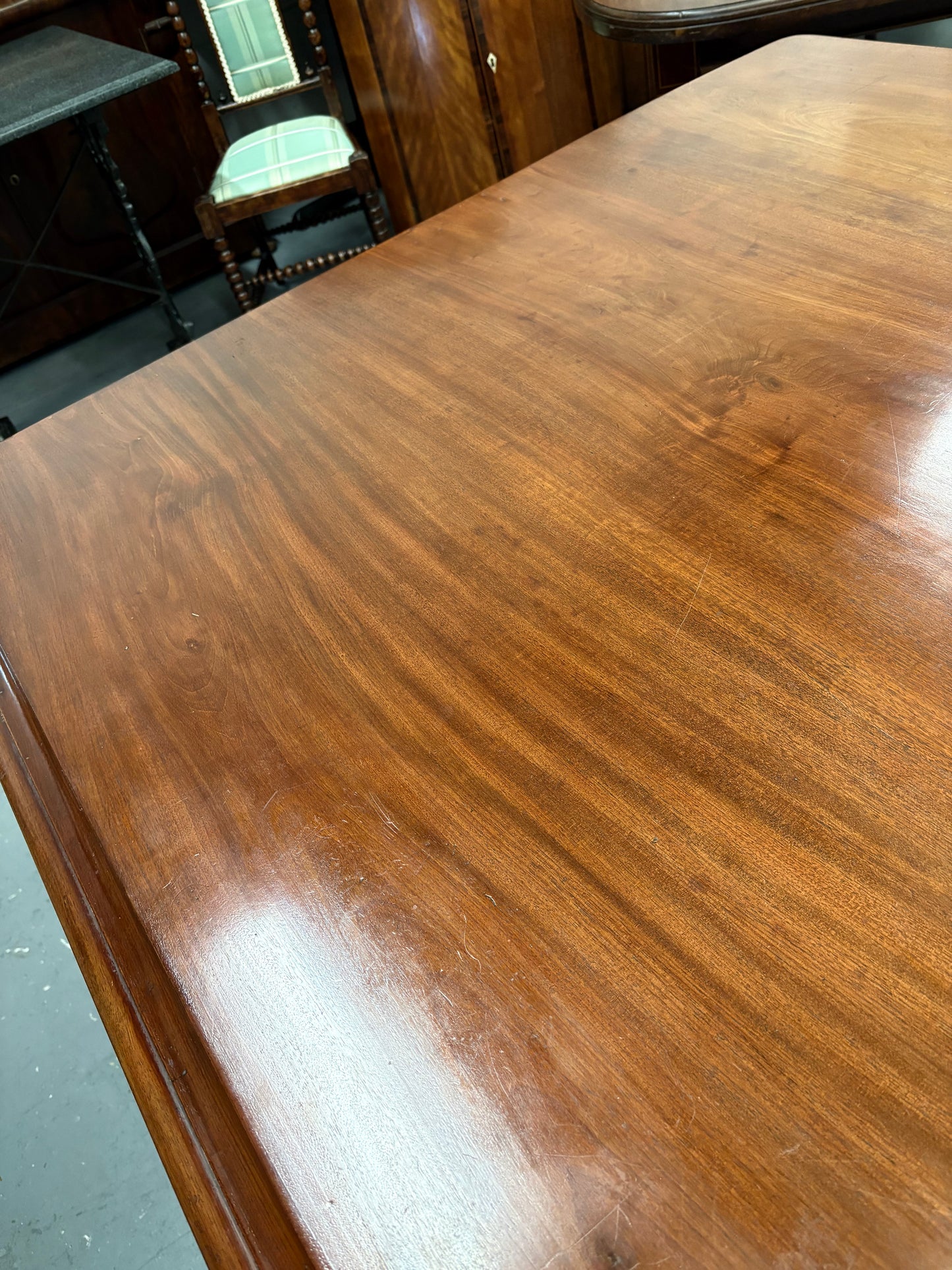 Victorian mahogany centre or dining table, rectangular top with folding action Seats 4