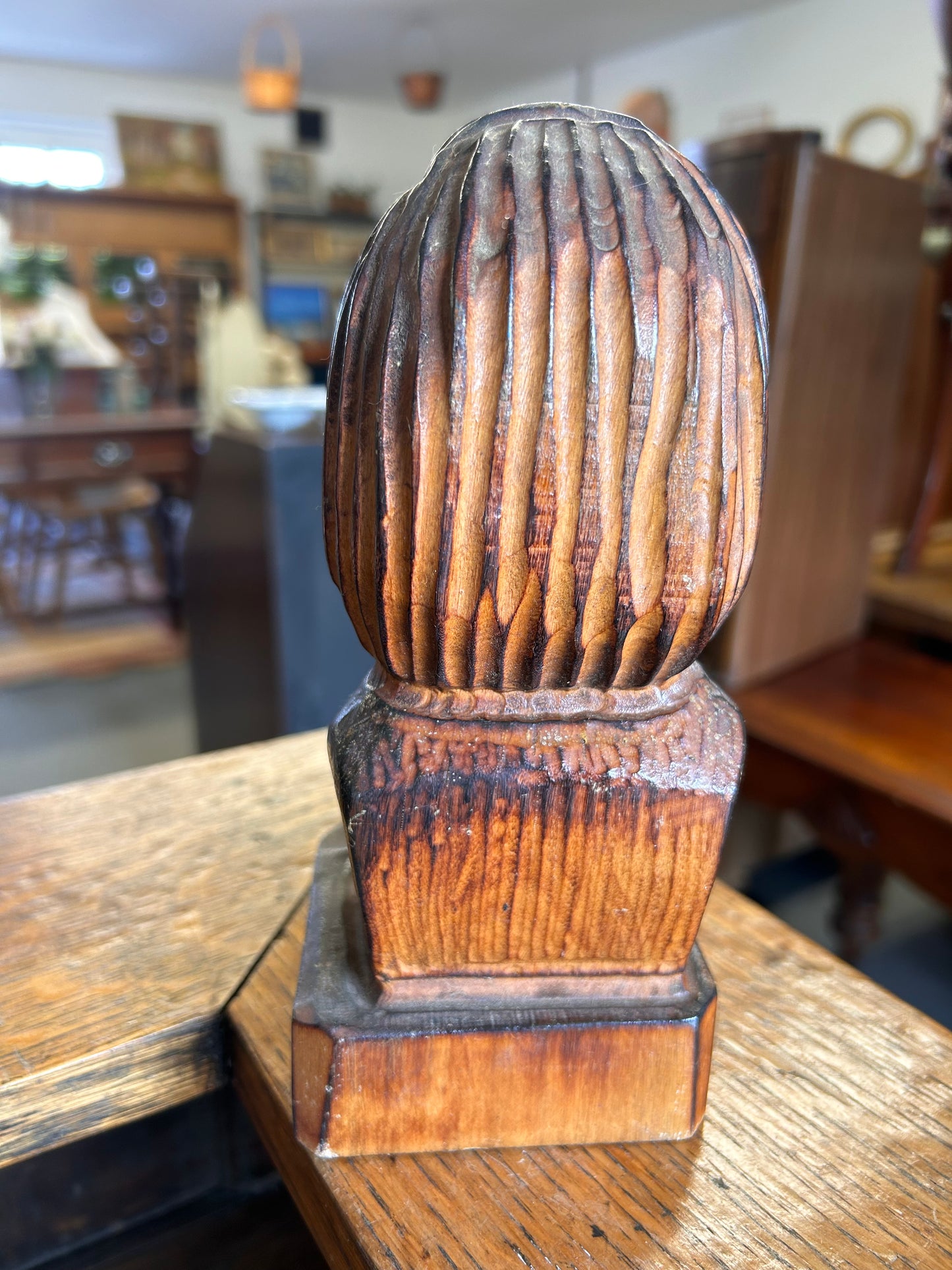 A wooden antique carved bust of the composer Chopin