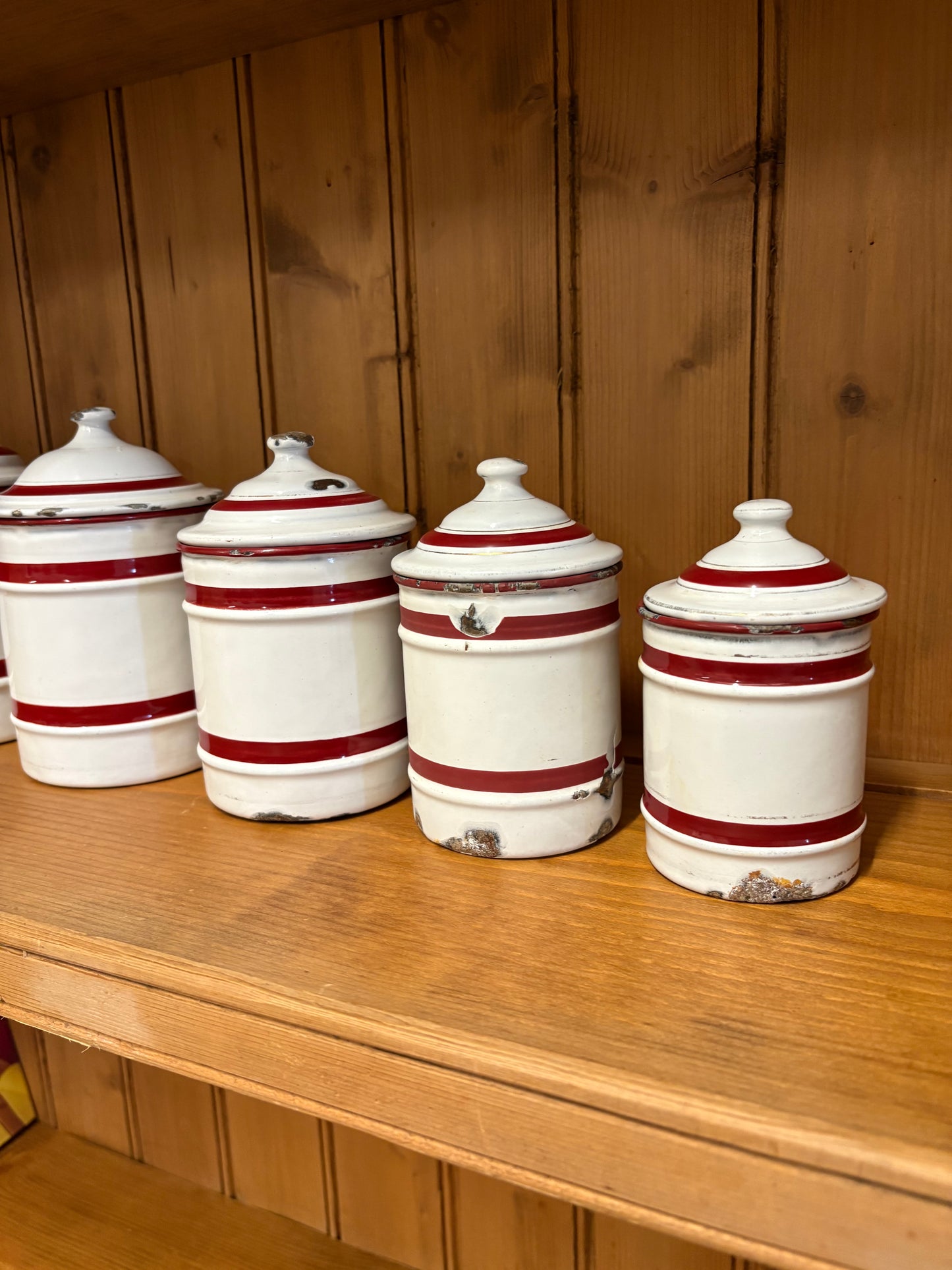 Set of six French Vintage storage canisters, red and white enamel ￼