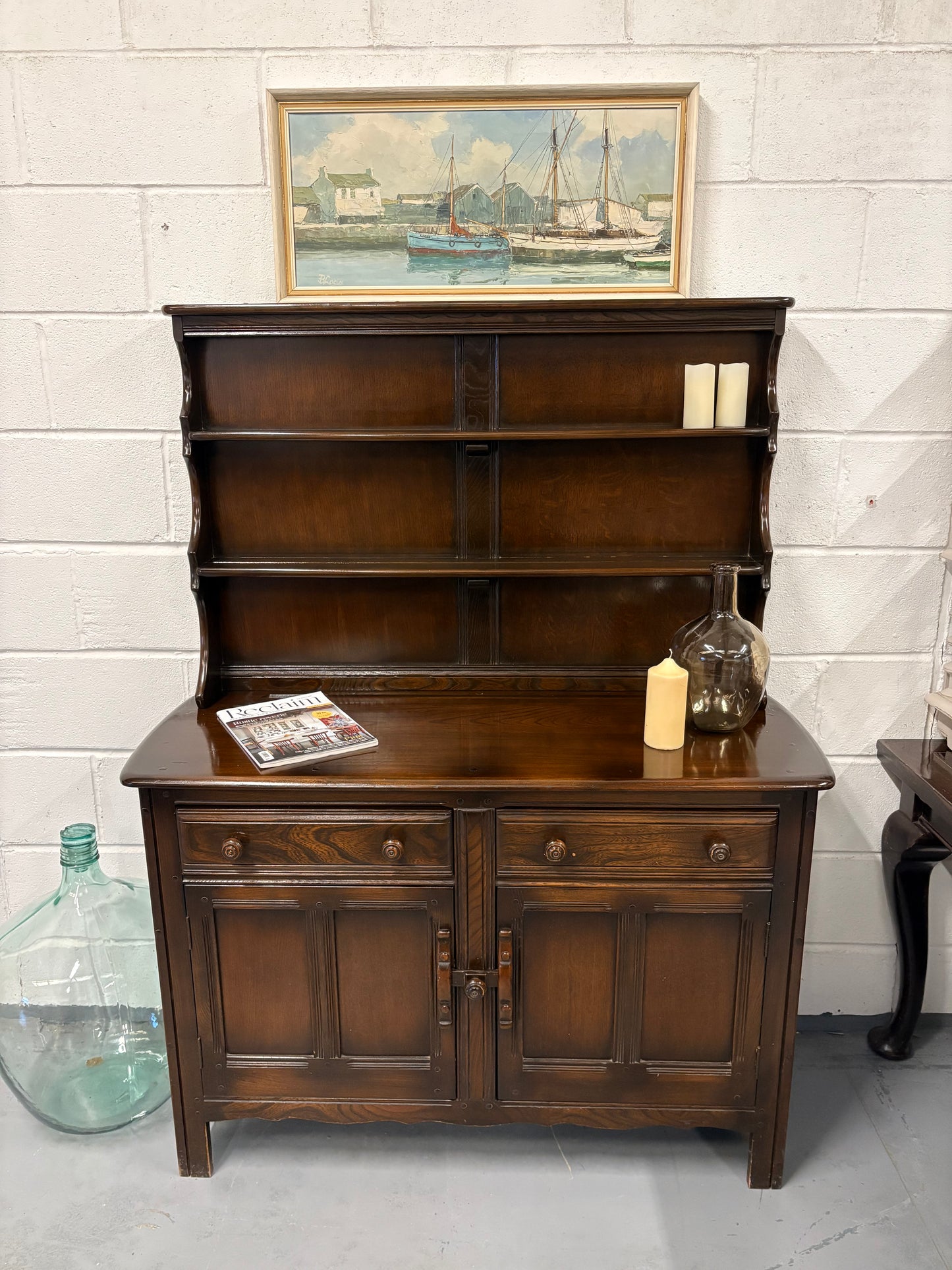 A vintage ERCOL Old Colonial dresser two drawers cupboards plate rack kitchen storage