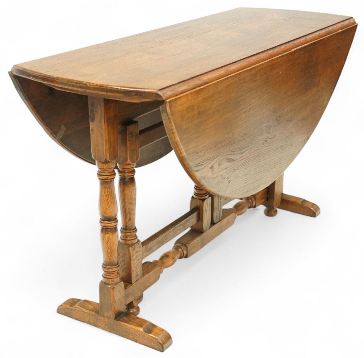 Early 20th century oak gate-leg Dining table - oval top on twin gate turned legs