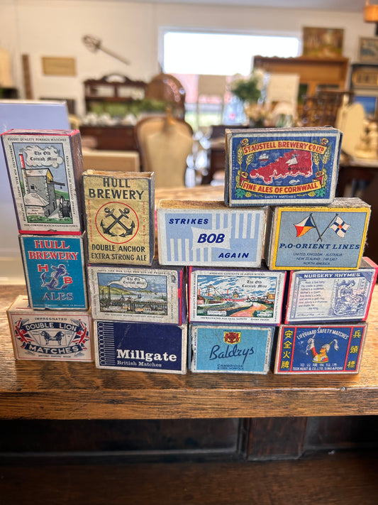 A collection of blue tone vintage match boxes 13 in total great display item